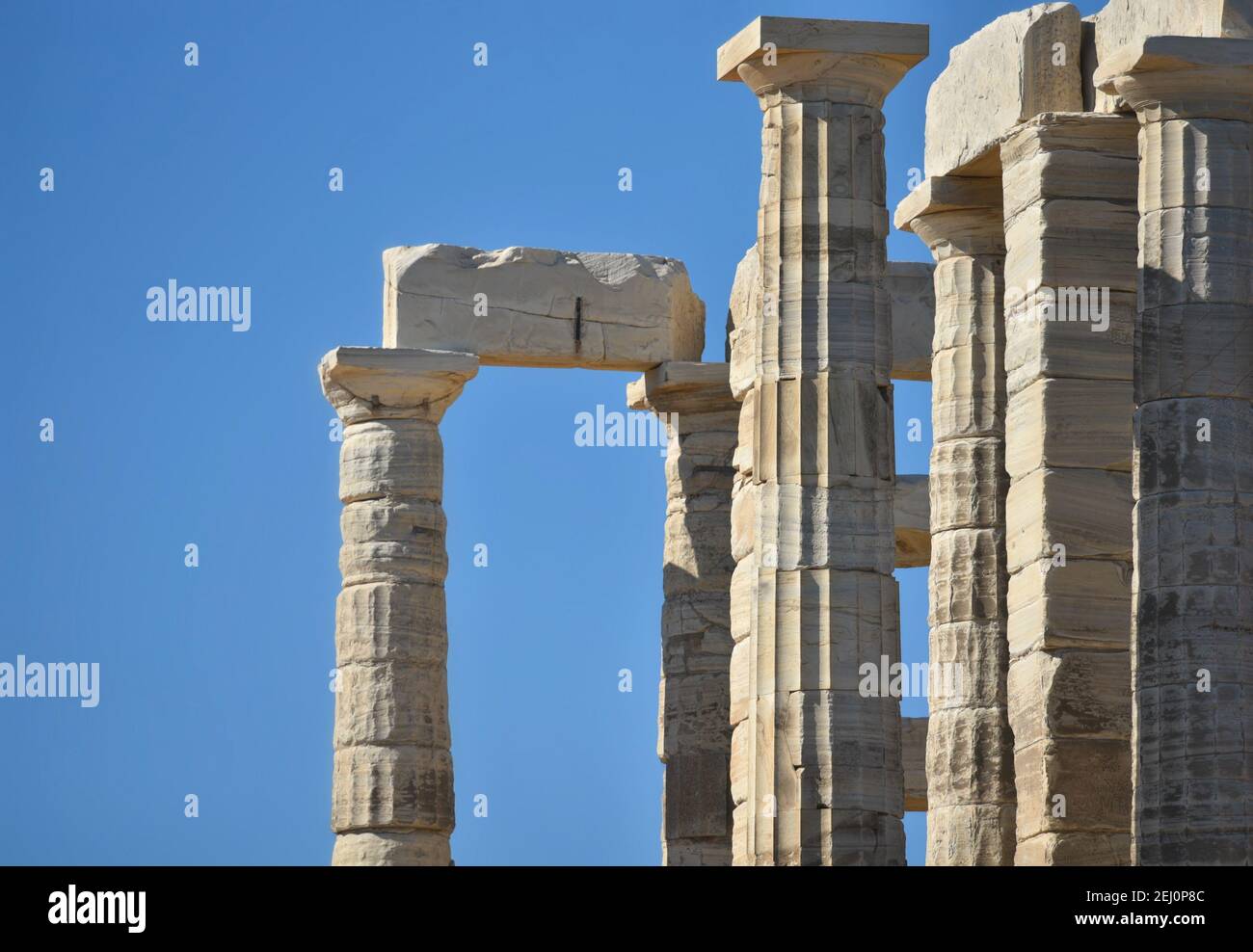 Marble columns view of the ancient Greek Doric style Temple of Poseidon ...