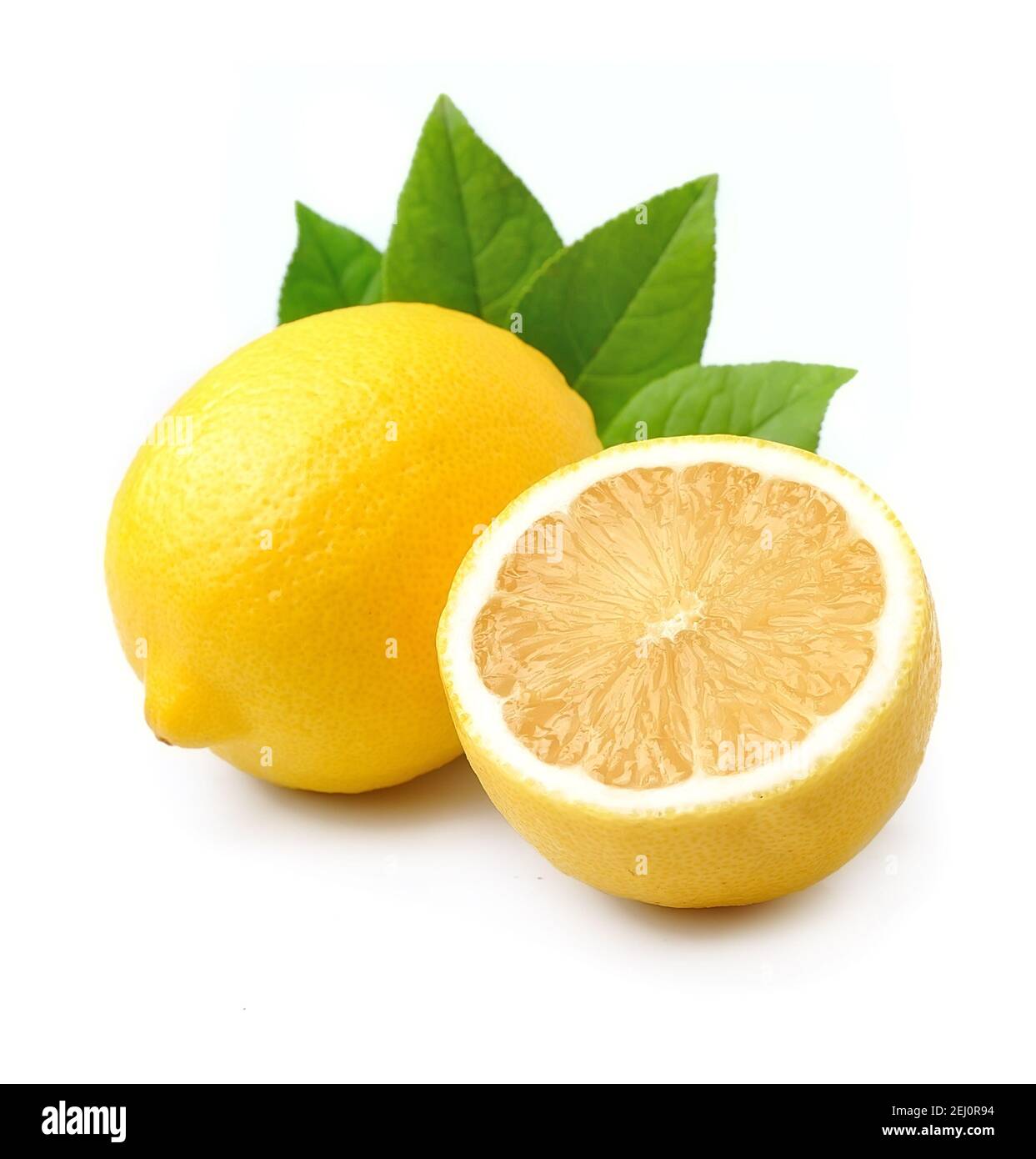 Ripe lemons with leaves isolated on white backgrounds Stock Photo - Alamy