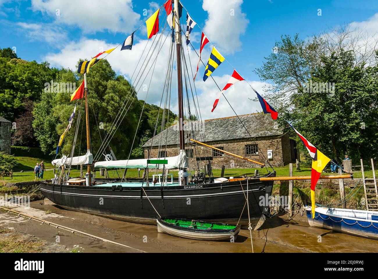 Boat and Quay at Cotehele House and Garden in Cornwall. Stock Photo