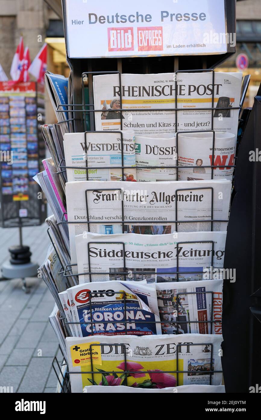 Close-up of a magazine and newspaper stand with German newspapers at a kiosk in downtown Düsseldorf. Stock Photo