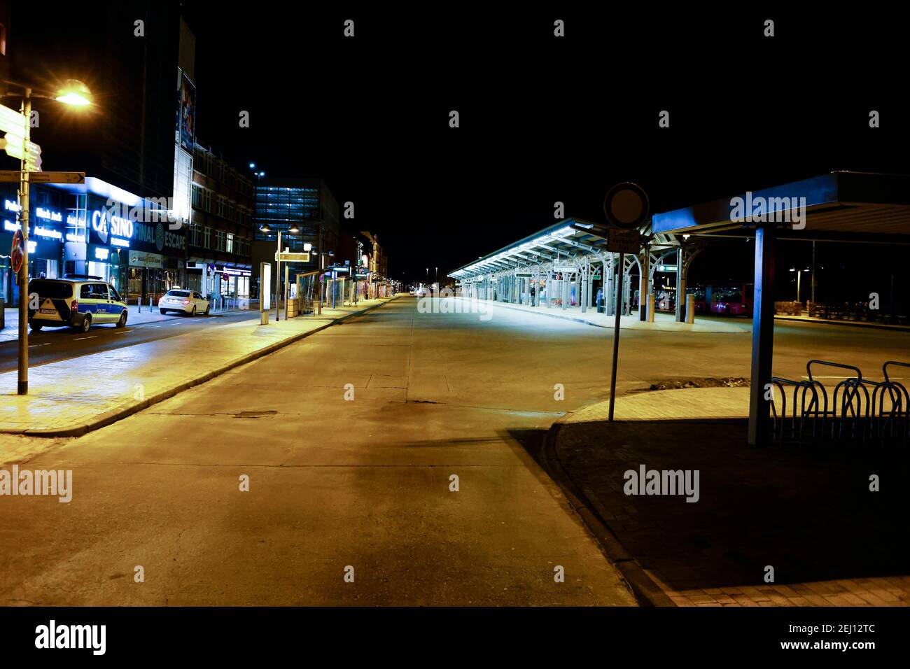 Flensburg, Germany. 20th Feb, 2021. Not a soul to be seen at the bus station. On Saturday evening, February 20, a nightly curfew from 9 p.m. to 5 a.m. came into effect in Flensburg. Previously possible meetings between a household and another person are not allowed. Credit: Frank Molter/dpa/Alamy Live News Stock Photo