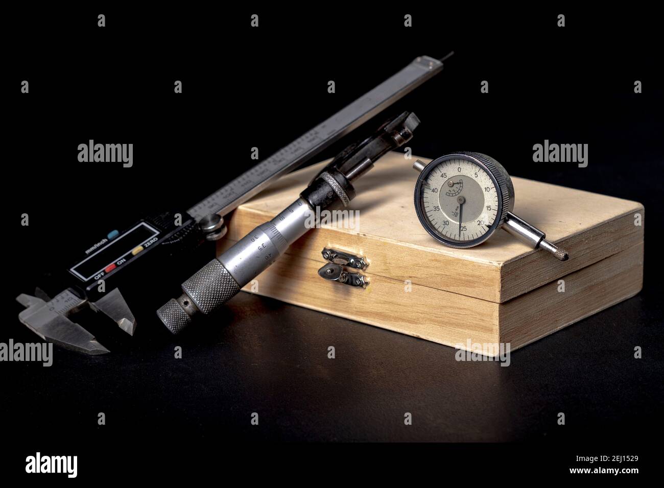 Wooden box with measuring tools. Accessories for mechanics and ...