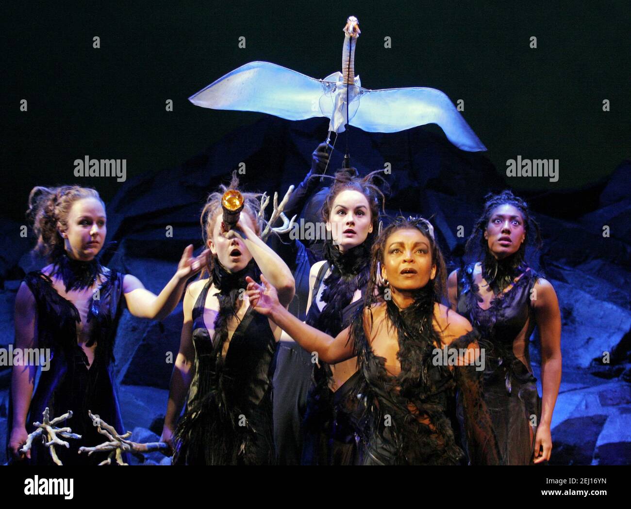 front right: Adjoa Andoh (Serafina Pekkala, Queen of the Lapland Witches) in HIS DARK MATERIALS by Philip Pullman at the Olivier Theatre, National Theatre (NT), London SE1  08/12/2004  adapted by Nicholas Wright  set design: Giles Cadle  costumes: Jon Morrell  puppets: Michael Curry  choreographer: Aletta Collins  fights: Terry King  lighting: Paule Constable  directors: Nicholas Hytner & Matt Wilde Stock Photo