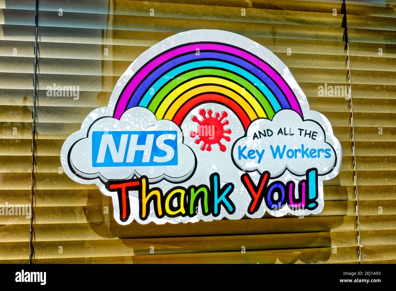 Warminster, Wiltshire  UK - April 22 2020: A Thank You NHS  and All Key Workers Rainbow of Hope Sign in a window Stock Photo