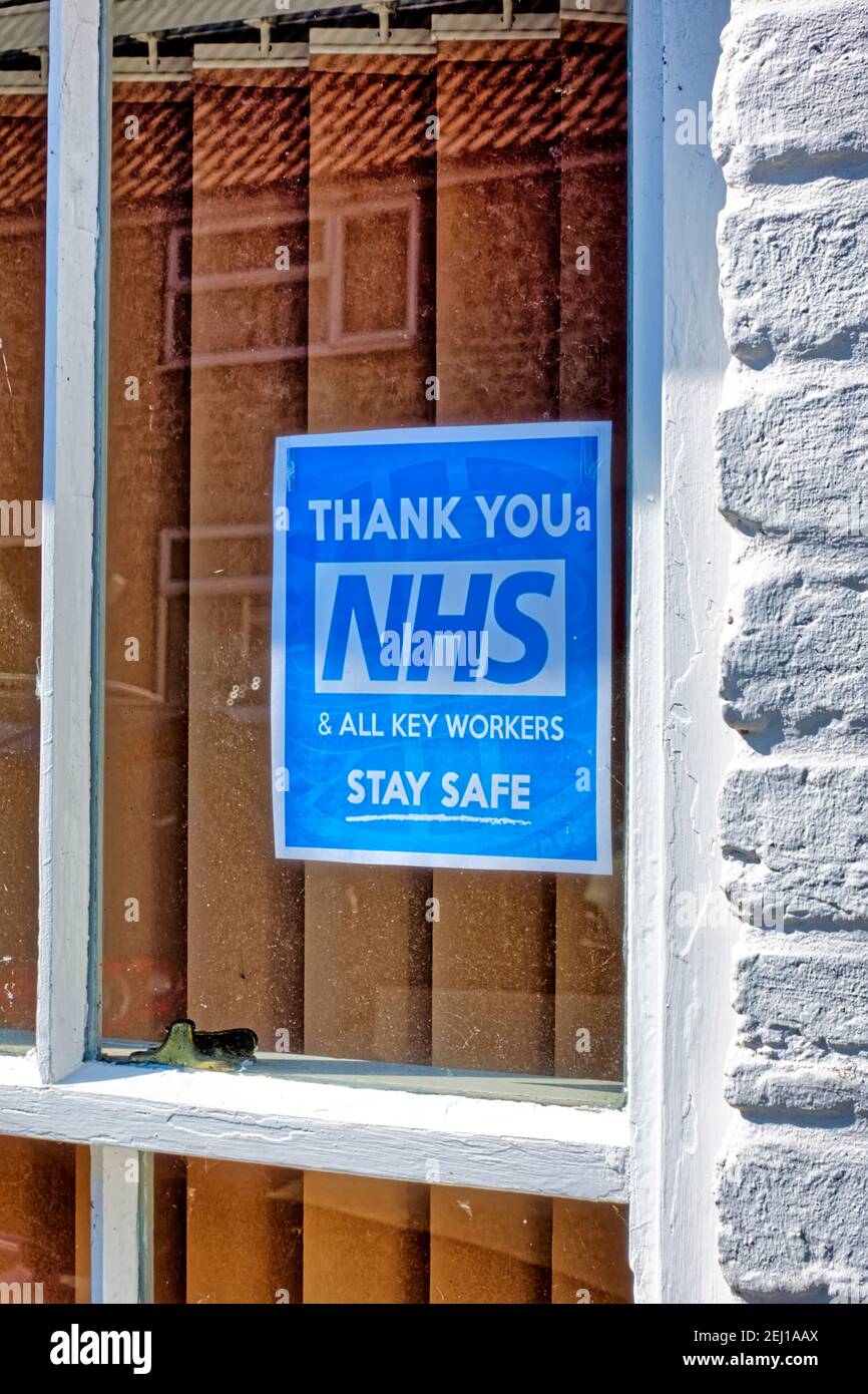 Warminster, Wiltshire  UK - May 4 2020: A Thank You NHS  All Key Workers Sign in a house window in Warminster, England Stock Photo