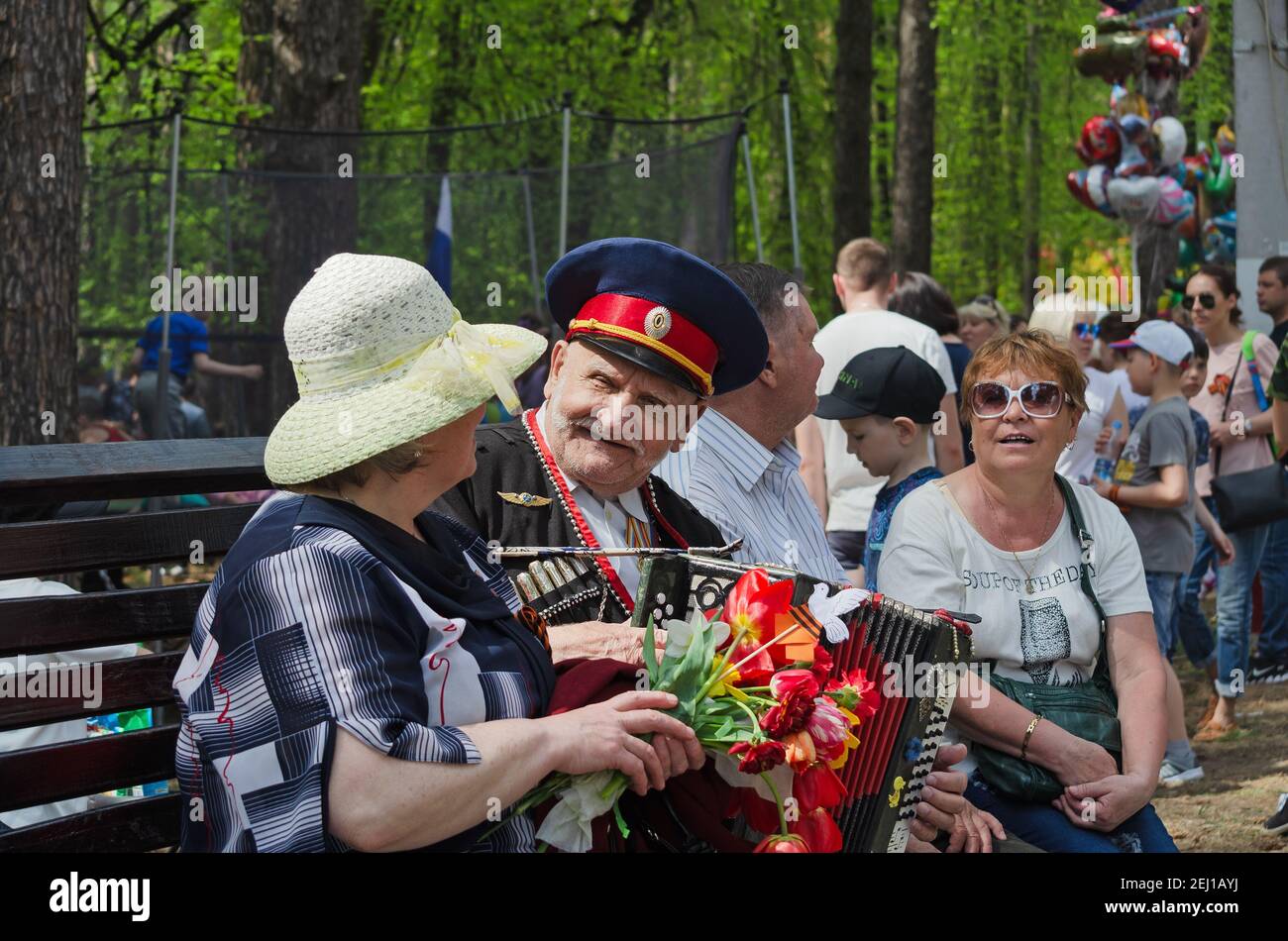 Elderly people sing to the accordion, at the celebration of Victory Day. Dimitrovgrad, Russia, May 9, 2019 Stock Photo