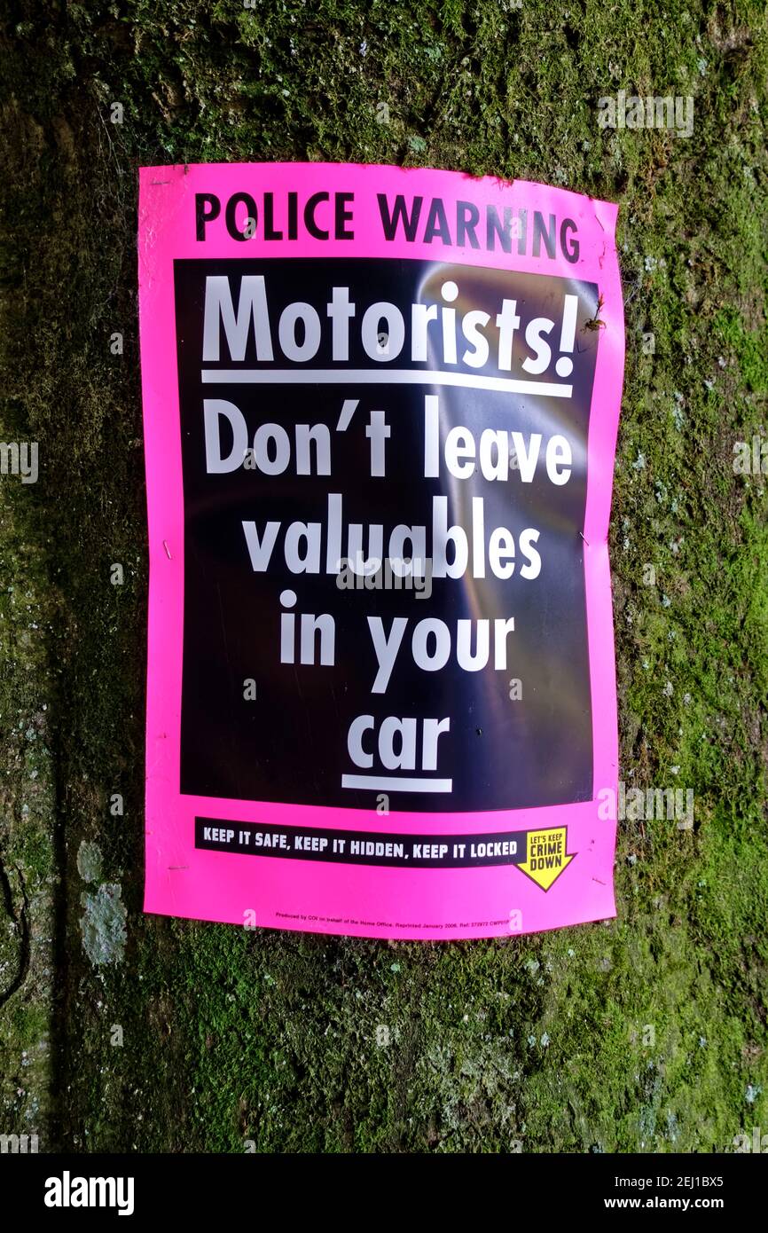 Crockerton, Wiltshire / UK - September18 2020: A Police poster warning motorist's not to leave valuables in their car at Shearwater Lake beauty spot Stock Photo