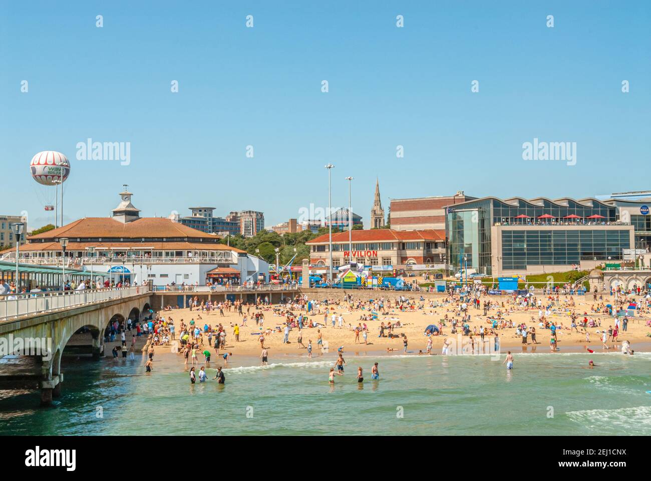 Locals and tourists at the popular holiday resort Bournemouth in Dorset, South England. Stock Photo