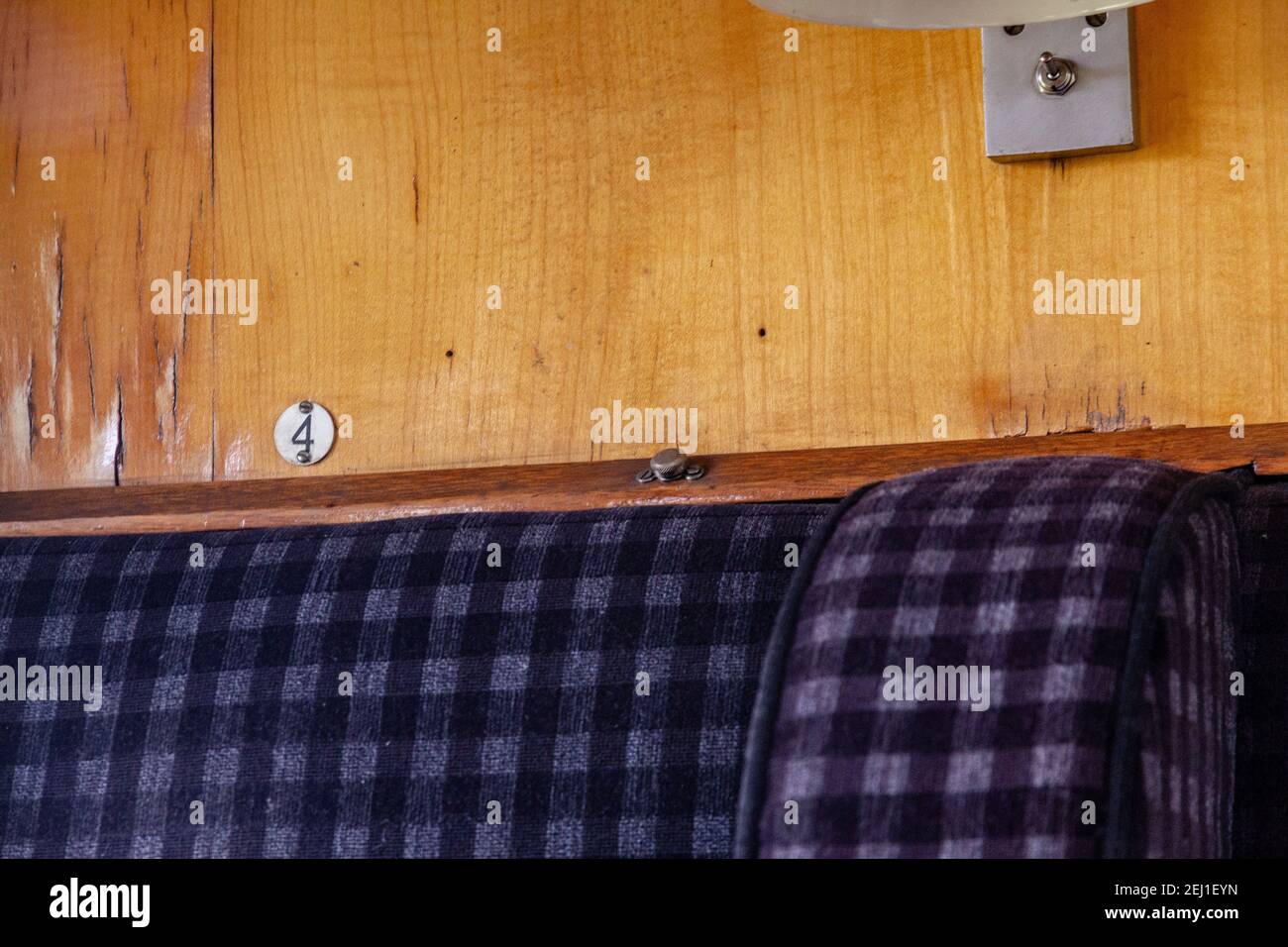 Saet Number Train Detail of a seat number inside an old train Stock Photo - Alamy