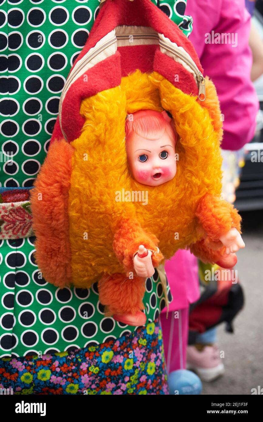 Hand made, baby doll back pack worn during Mardi Gras. Stock Photo