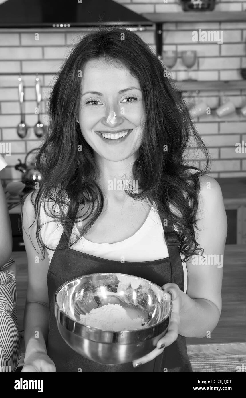 Woman baking powder nose cooking pie cake cookies, bakery concept. Stock Photo