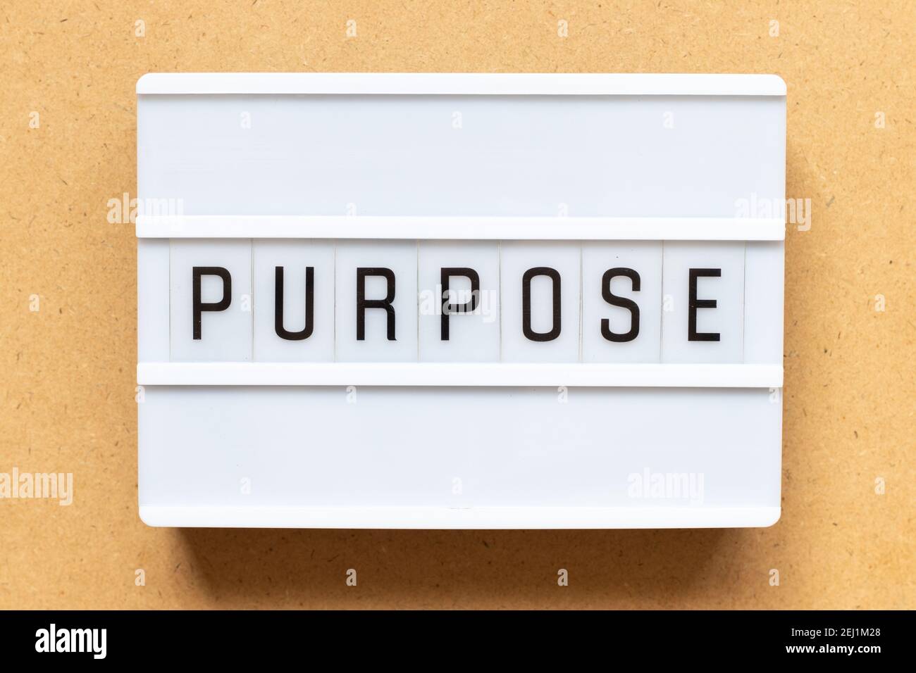Lightbox with word purpose on wood background Stock Photo