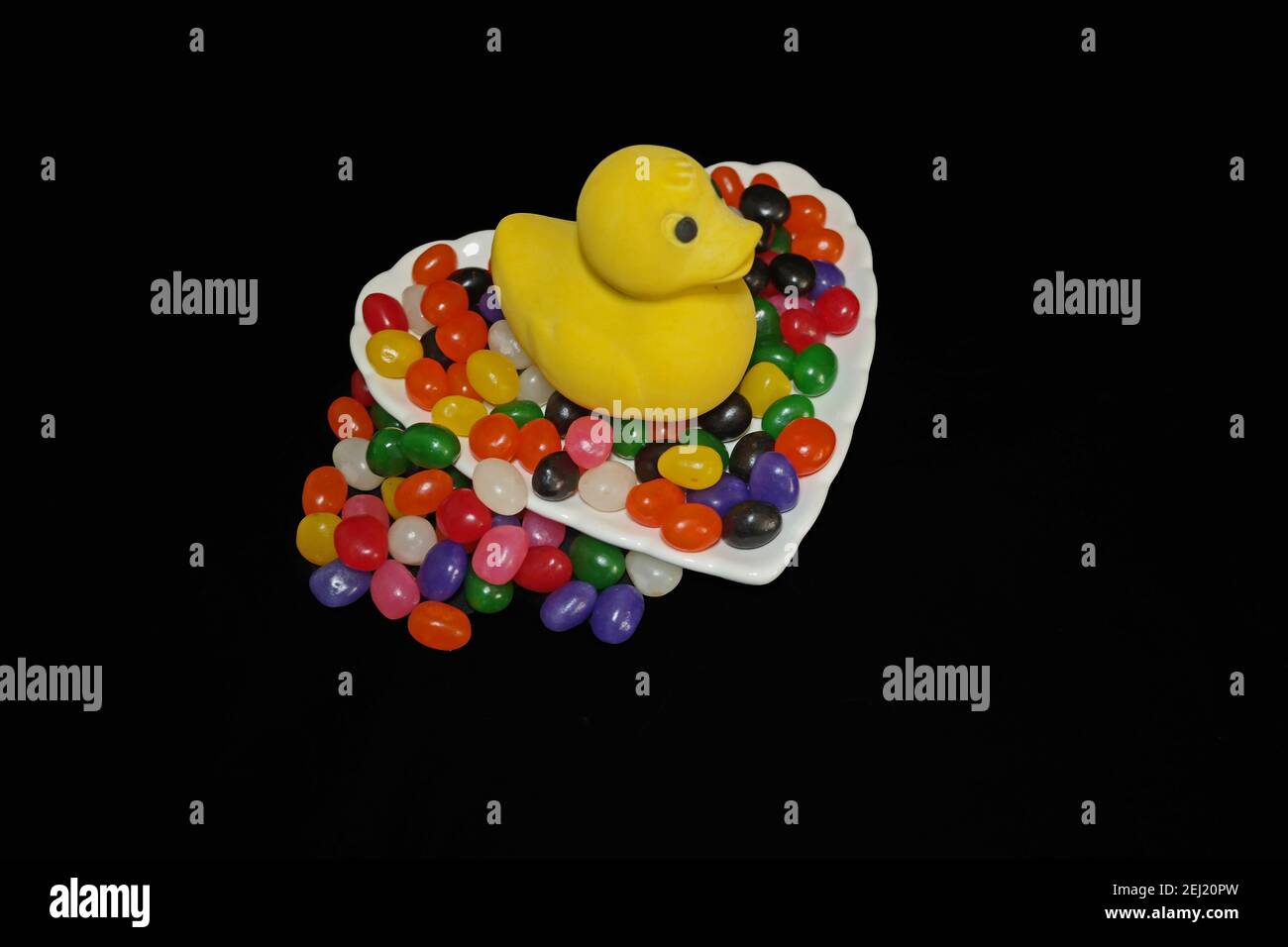 Rubber Duck with Candy Stock Photo