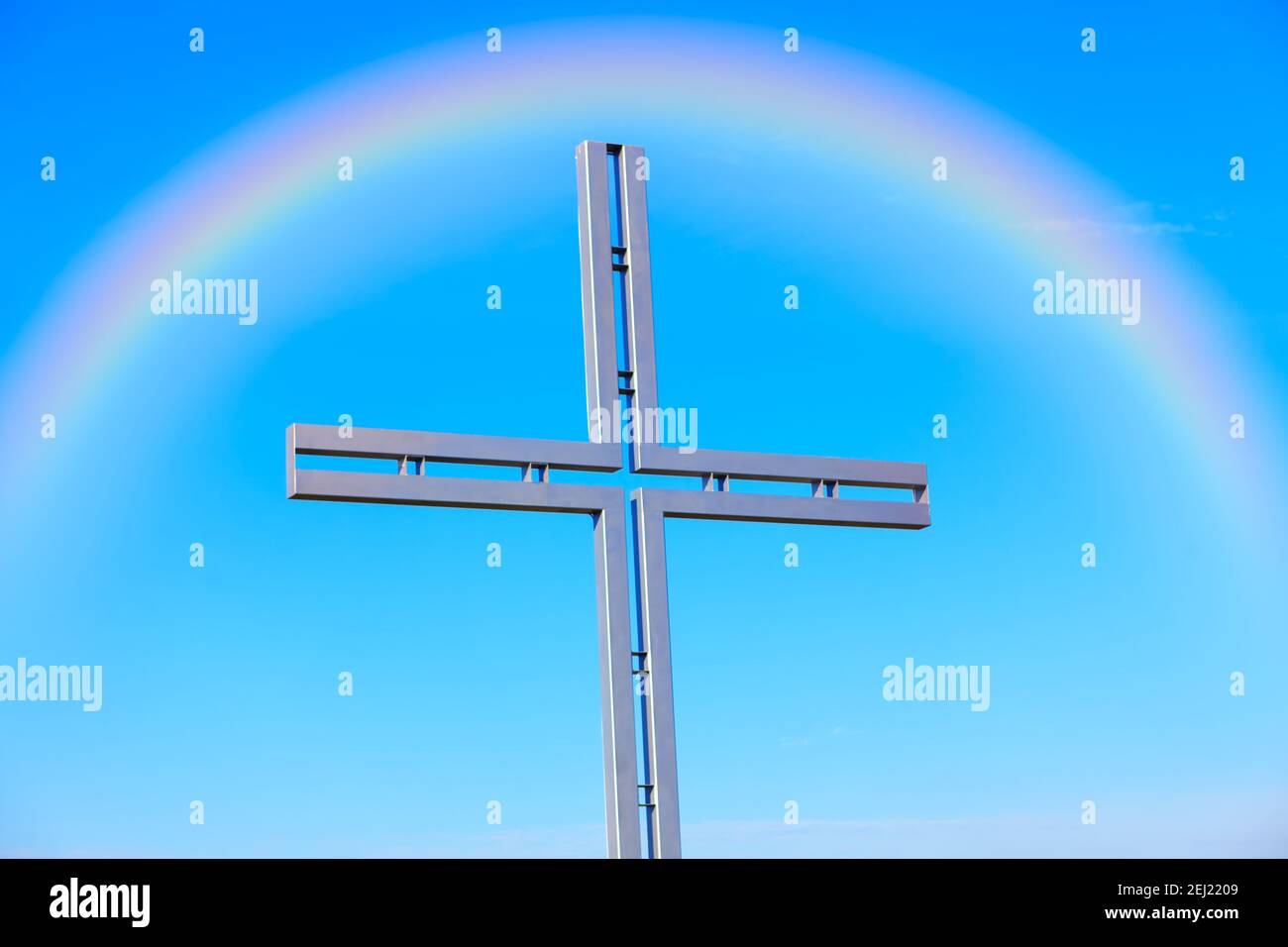 Rainbow and religious cross . Symbol of Christianity Stock Photo Alamy