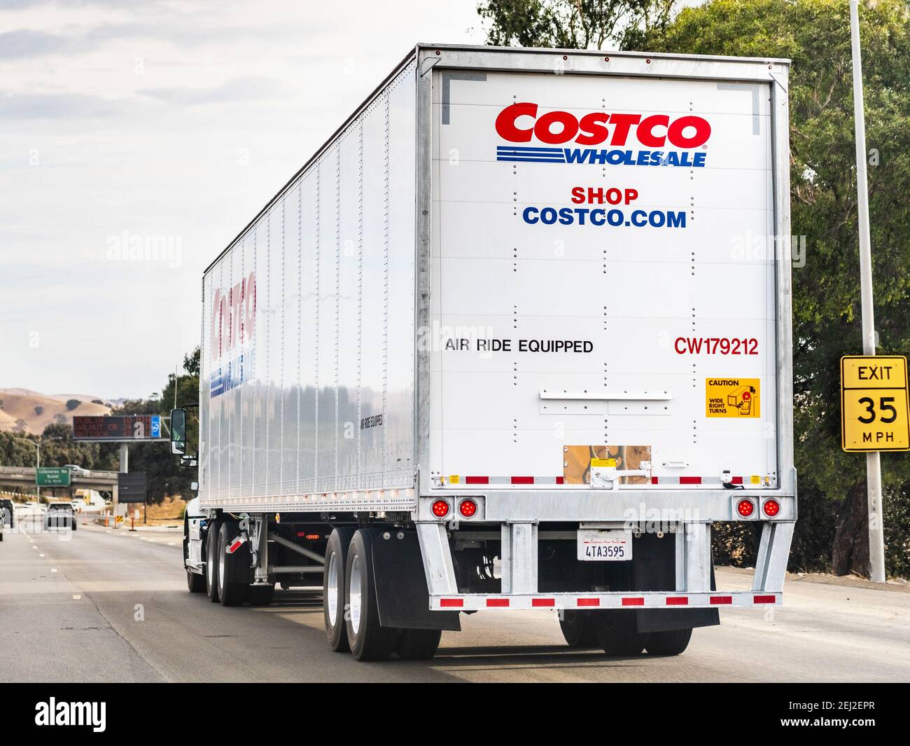 Oct 10, 2020 Fremont / CA / USA - Costco Wholesale truck driving on the freeway in East San Francisco Bay Area Stock Photo
