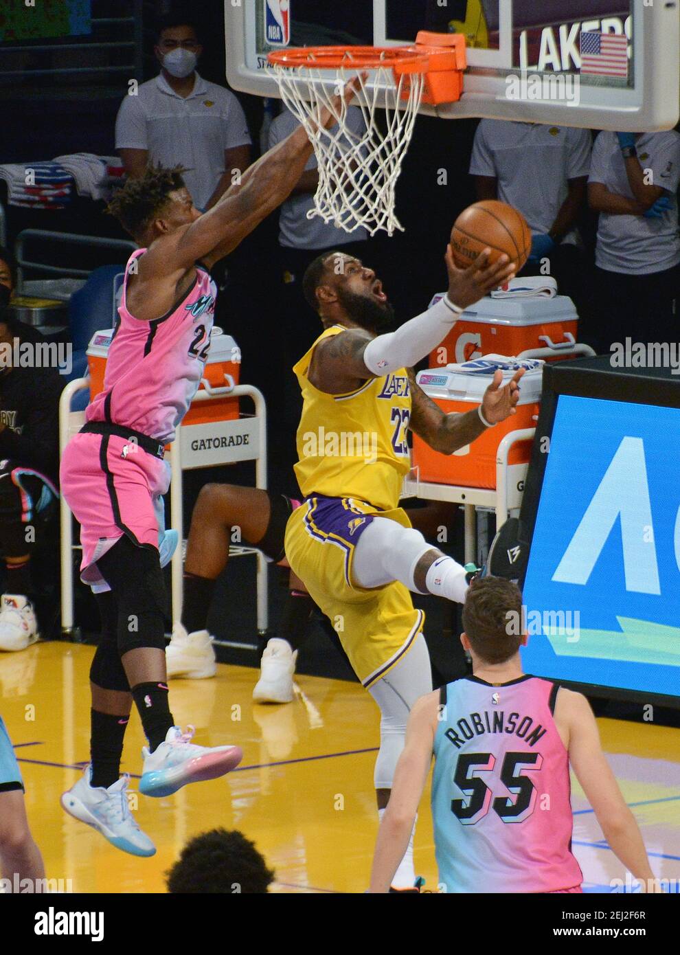 Los Angeles, United States. 20th Feb, 2021. Los Angeles Lakers' forward LeBron James scores on Miami Heat guard Jimmy Butler during the second half at Staples Center in Los Angeles on Saturday, February 20, 2021. The Heat defeated the Lakers 96-94. Photo by Jim Ruymen/UPI Credit: UPI/Alamy Live News Stock Photo
