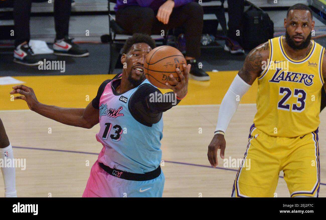 Los Angeles, United States. 20th Feb, 2021. Miami Heat center Bam Adebayo secures the offensive rebound as Los Angeles Lakers' forward LeBron James looks on during the second half at Staples Center in Los Angeles on Saturday, February 20, 2021. The Heat defeated the Lakers 96-94. Photo by Jim Ruymen/UPI Credit: UPI/Alamy Live News Stock Photo