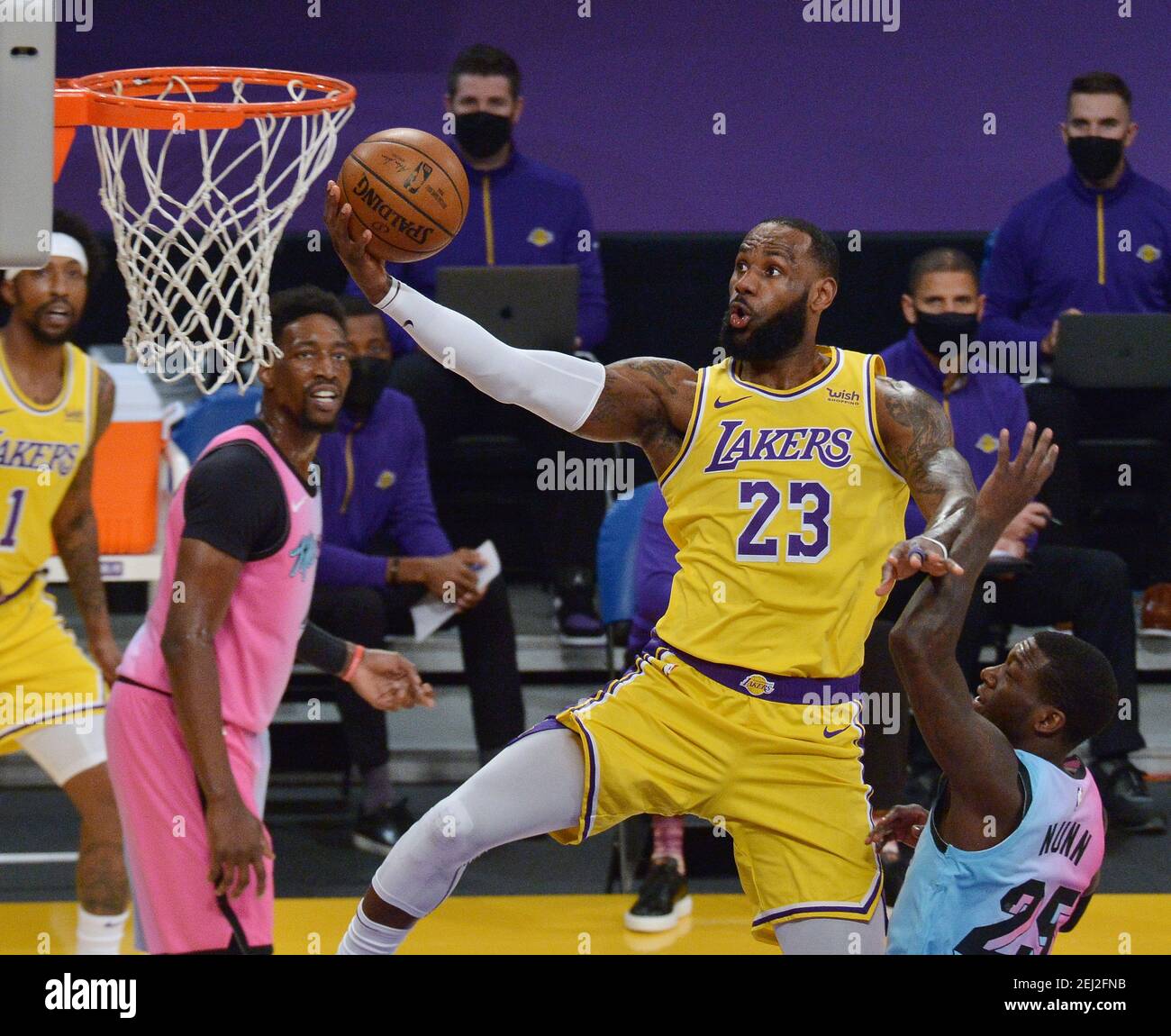 Los Angeles, United States. 20th Feb, 2021. Los Angeles Lakers' forward LeBron James puts up a shot in front of Miami Heat guard Kendrick Nunn during the first half of the Lakers' 96-94 loss at Staples Center in Los Angeles on Saturday, February 20, 2021. Photo by Jim Ruymen/UPI Credit: UPI/Alamy Live News Stock Photo