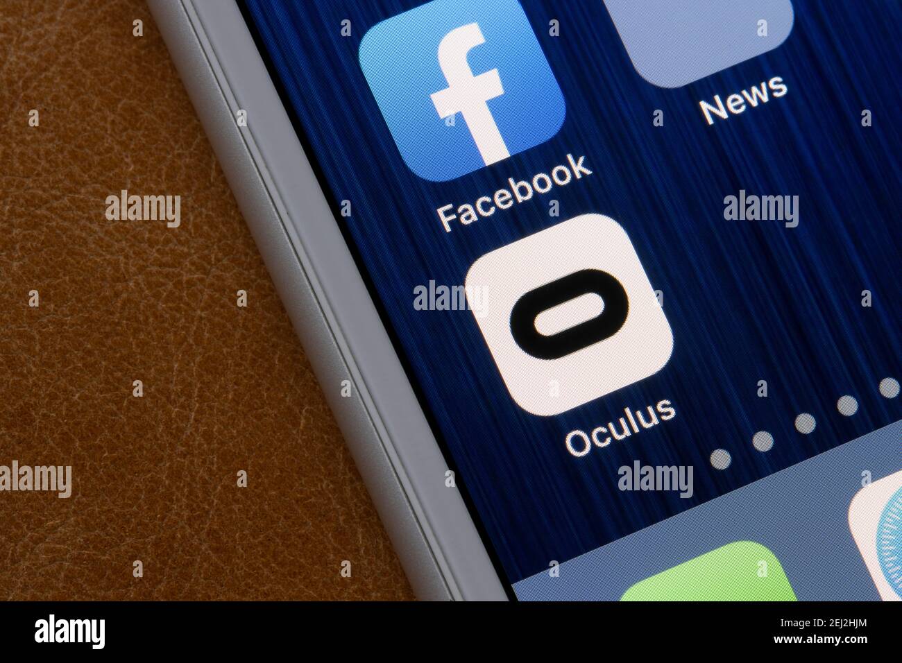 Oculus app icon is seen on an iPhone. Oculus is a brand of Facebook Technologies, LLC, which produces VR headsets, including the Rift and Quest lines. Stock Photo