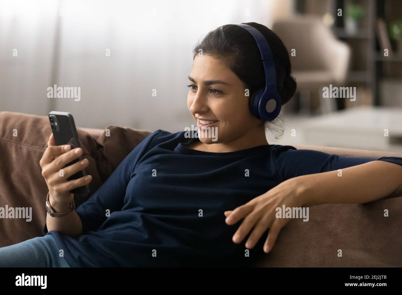 Happy overjoyed woman in wireless hi-res stock photography and images ...