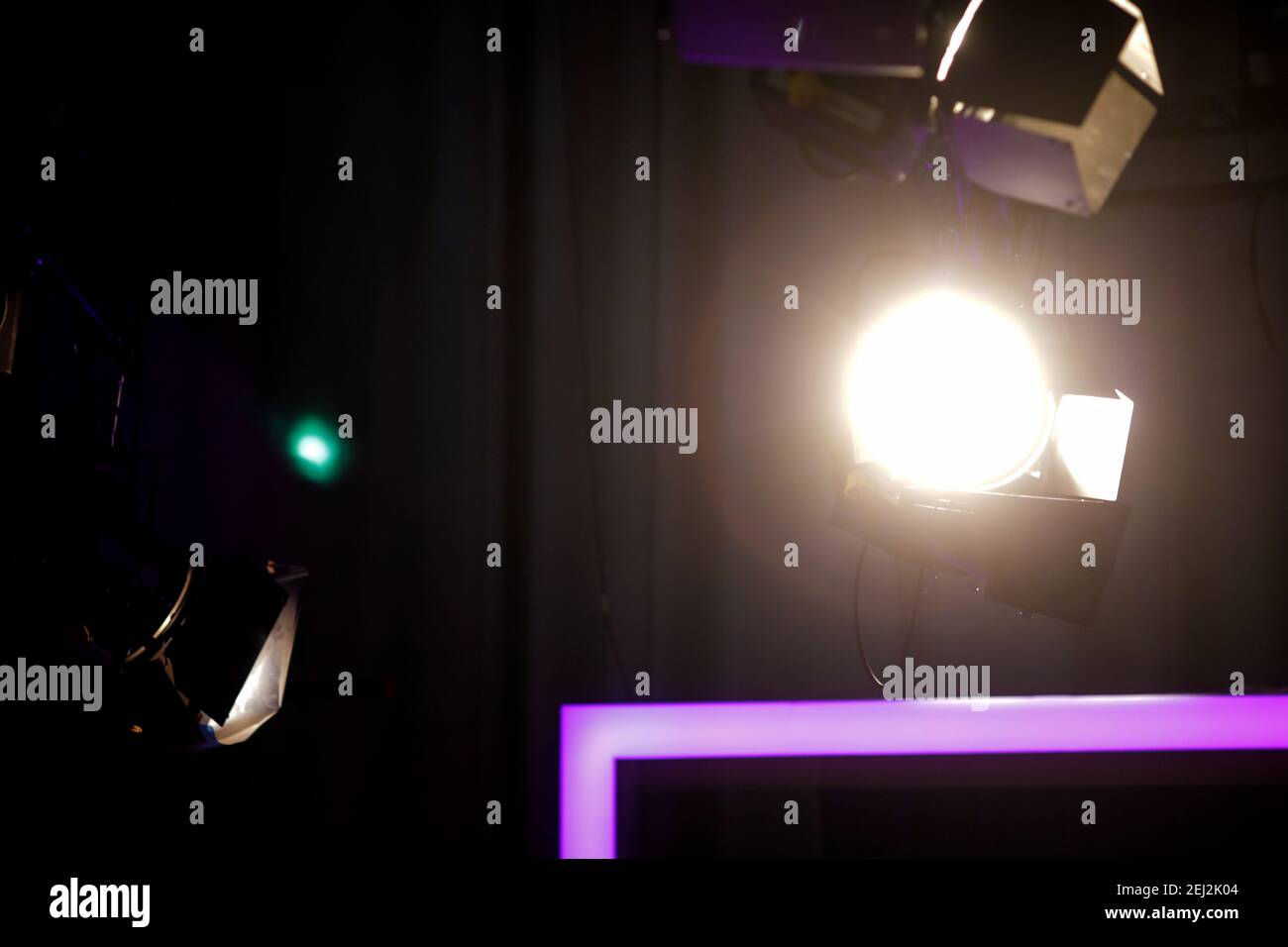 Professional lighting equipment in the studio of a news broadcaster during a live transmission. Stock Photo