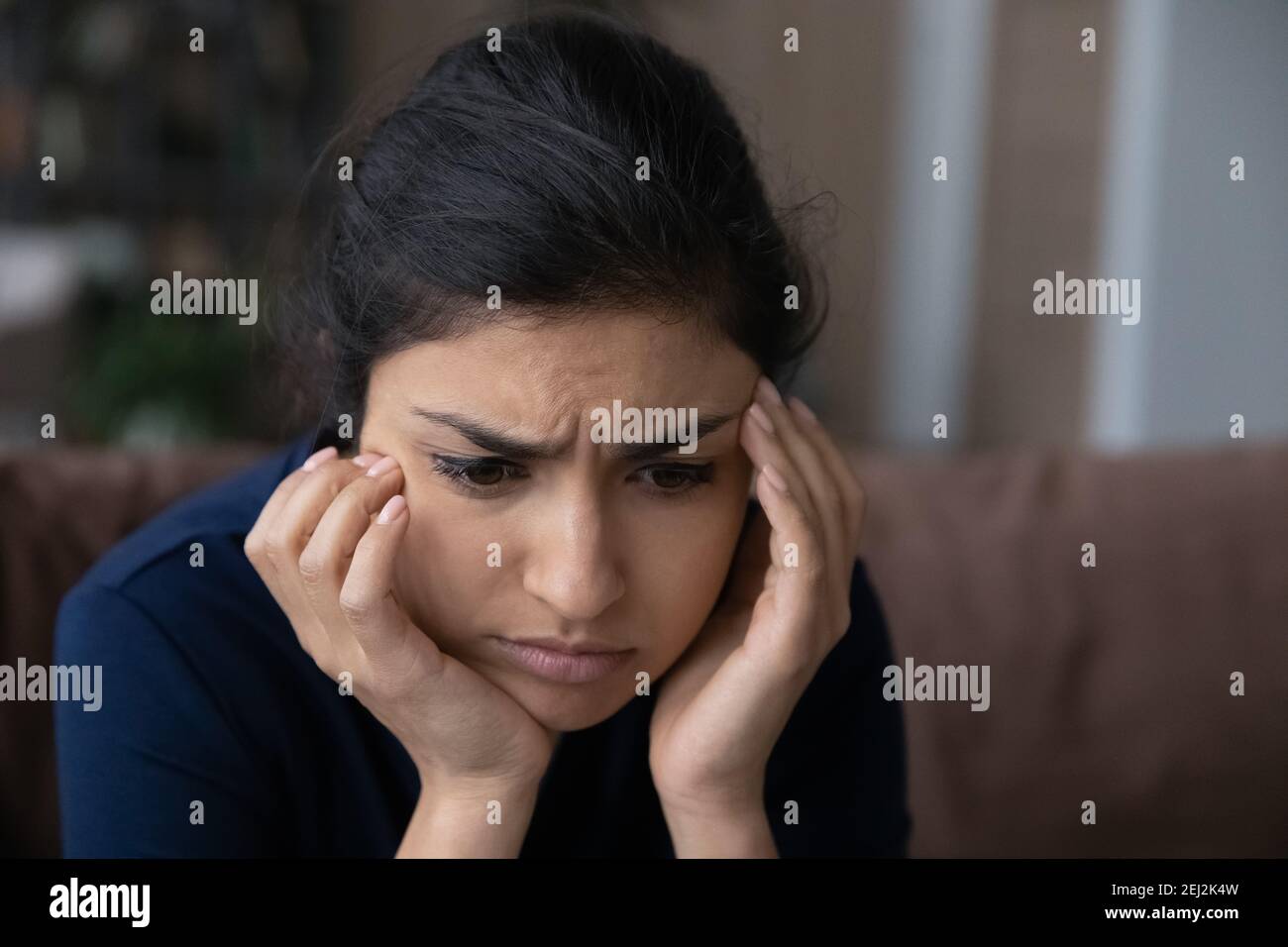 Pensive sad Indian woman thinking of problems Stock Photo - Alamy