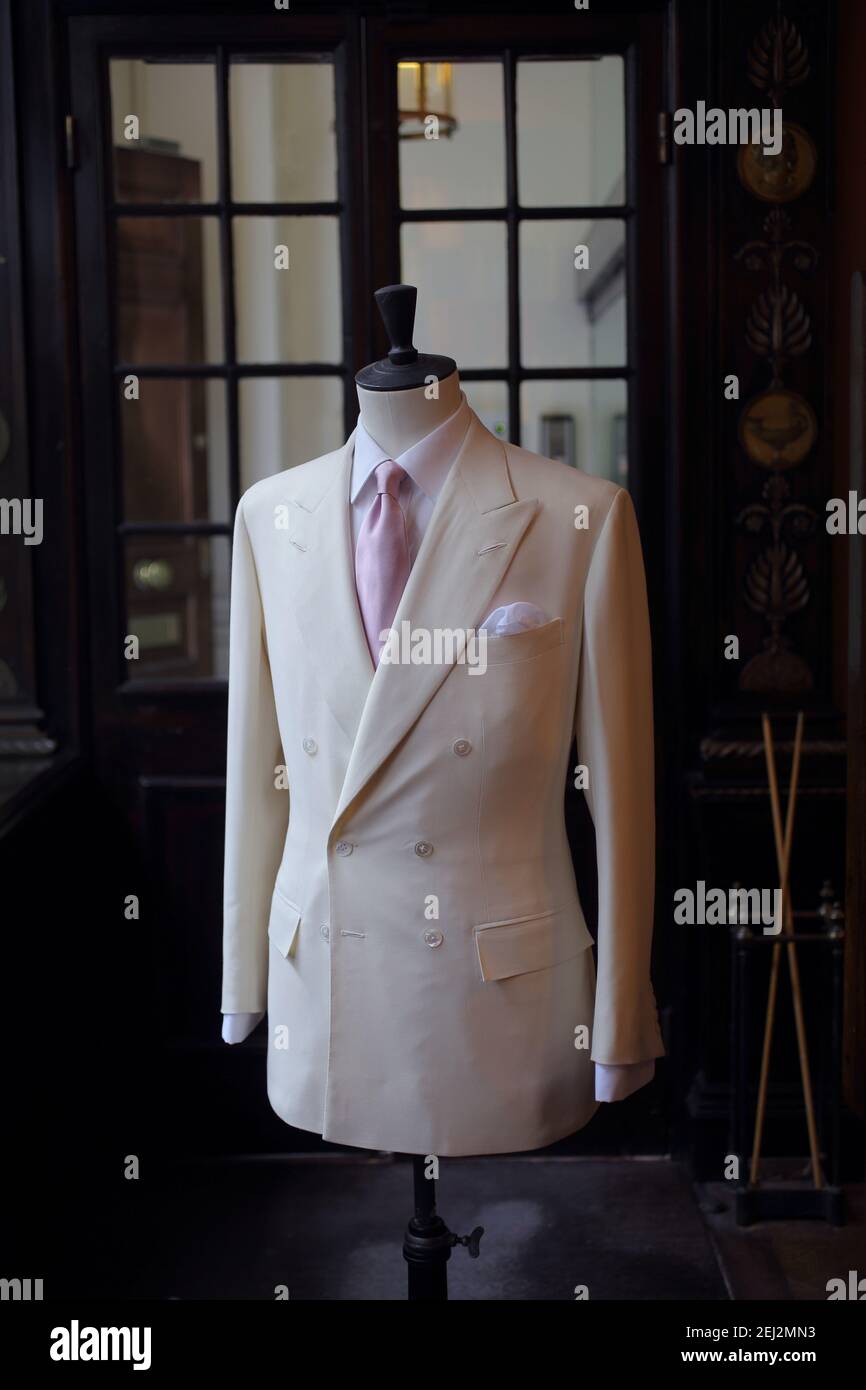 United Kingdom / London /Best of British/ Finished mens suit  on a bust at Anderson & Sheppard tailors in Saville Row, central London. Stock Photo