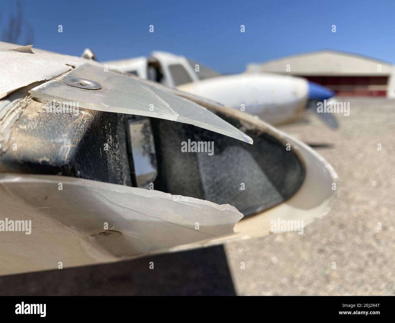 Old abandoned propeller airplane in a flying field. Stock Photo
