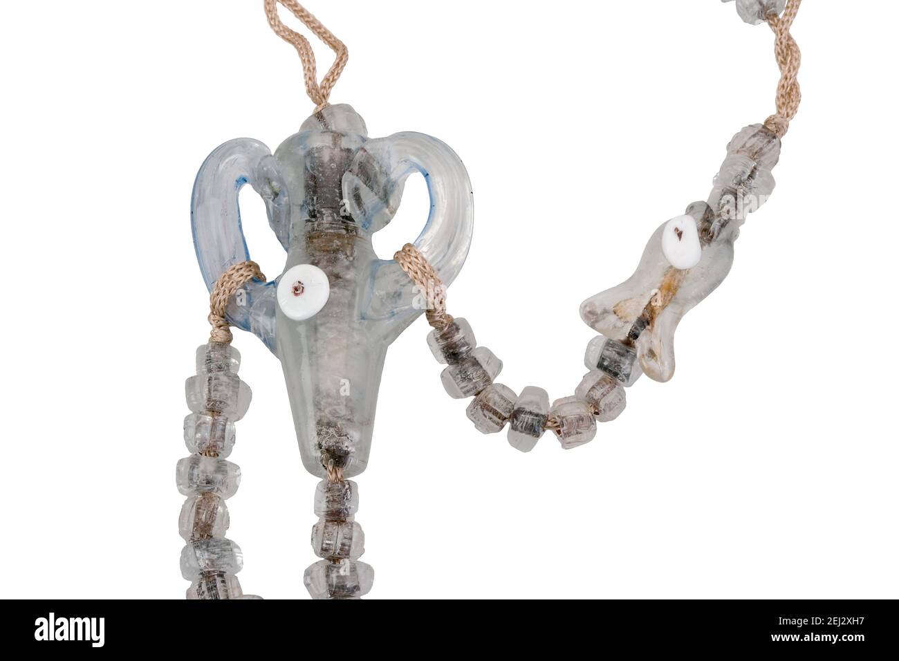 Ethnic stone necklace with pendant isolated on white background. Studio shoot. Stock Photo