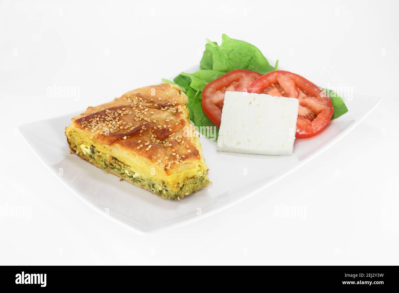Traditional greek spinach pie ( spanakopita ) with goat cheese Stock Photo
