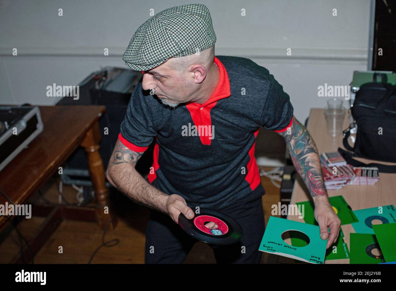 dj mixing records,  DJ busy changing records. Stock Photo