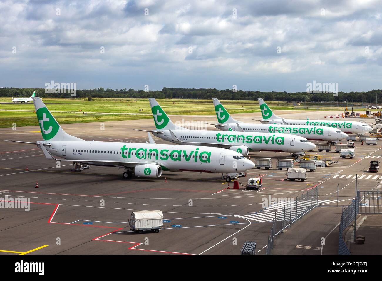 Transavia low-cost airline passenger planes on the tarmac of Eindhoven Airport. The Netherlands - June 30, 2020 Stock Photo