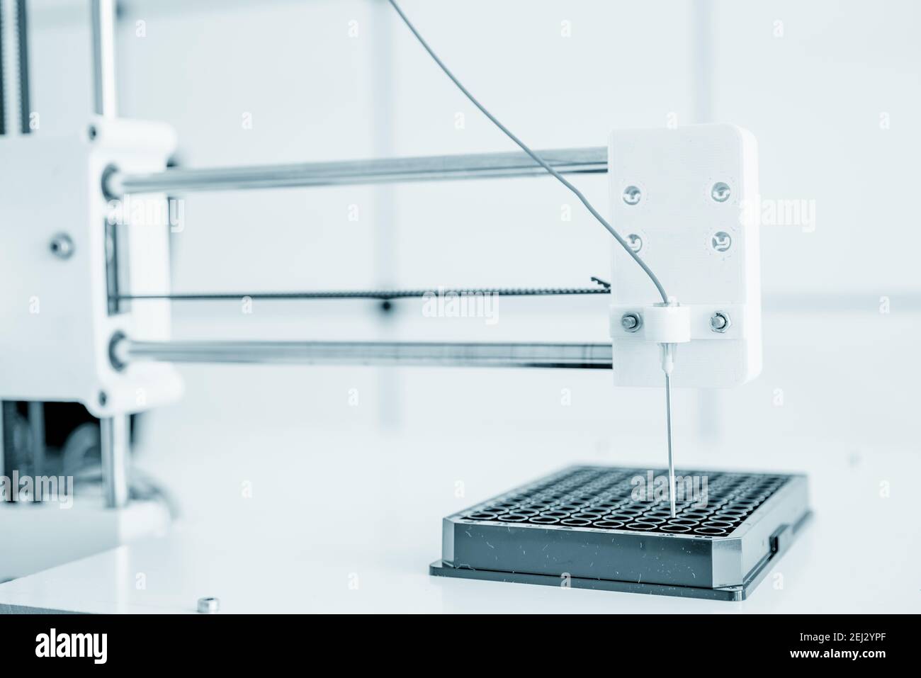 microbiological research pipette robot Stock Photo Alamy