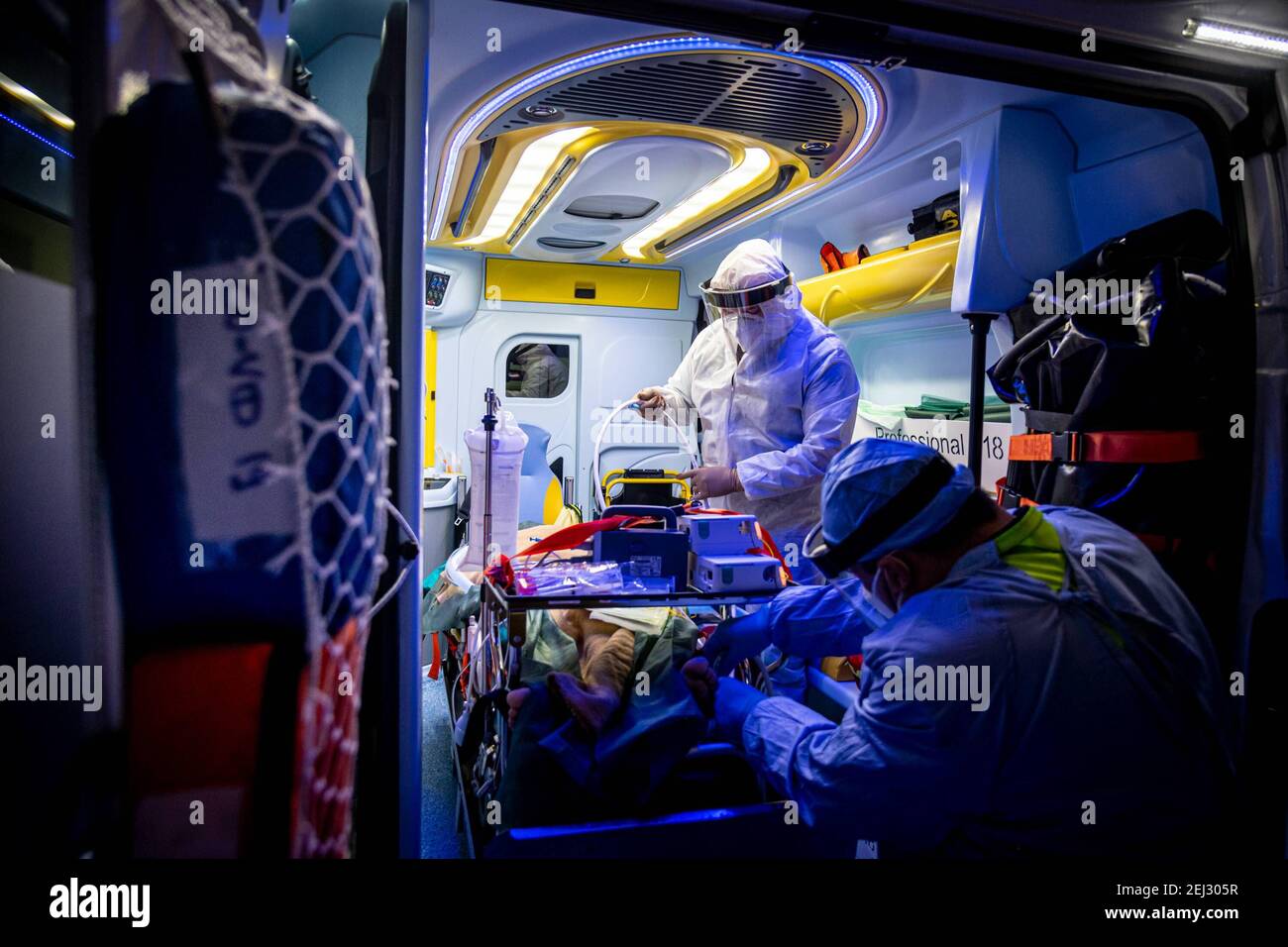 Reportage, Italy. 13th Mar, 2021. Monza - Rescuers of Brianza Emergency during the night shift carry out transfers of Covid-19 intensive care patients between the hospitals of Monza and Brianza. Transfer of an intubated patient (Milan - 2020-11-13, Marco Passaro) ps the photo can be used in compliance with the context in which it was taken, and without the defamatory intent of the decorum of the people represented Editorial Usage Only Credit: Independent Photo Agency/Alamy Live News Stock Photo