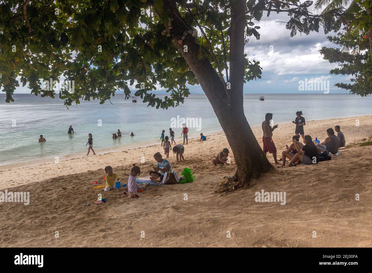 Amazing paradise Alona beach with palms in Bohol Panglao island, Philippines Stock Photo