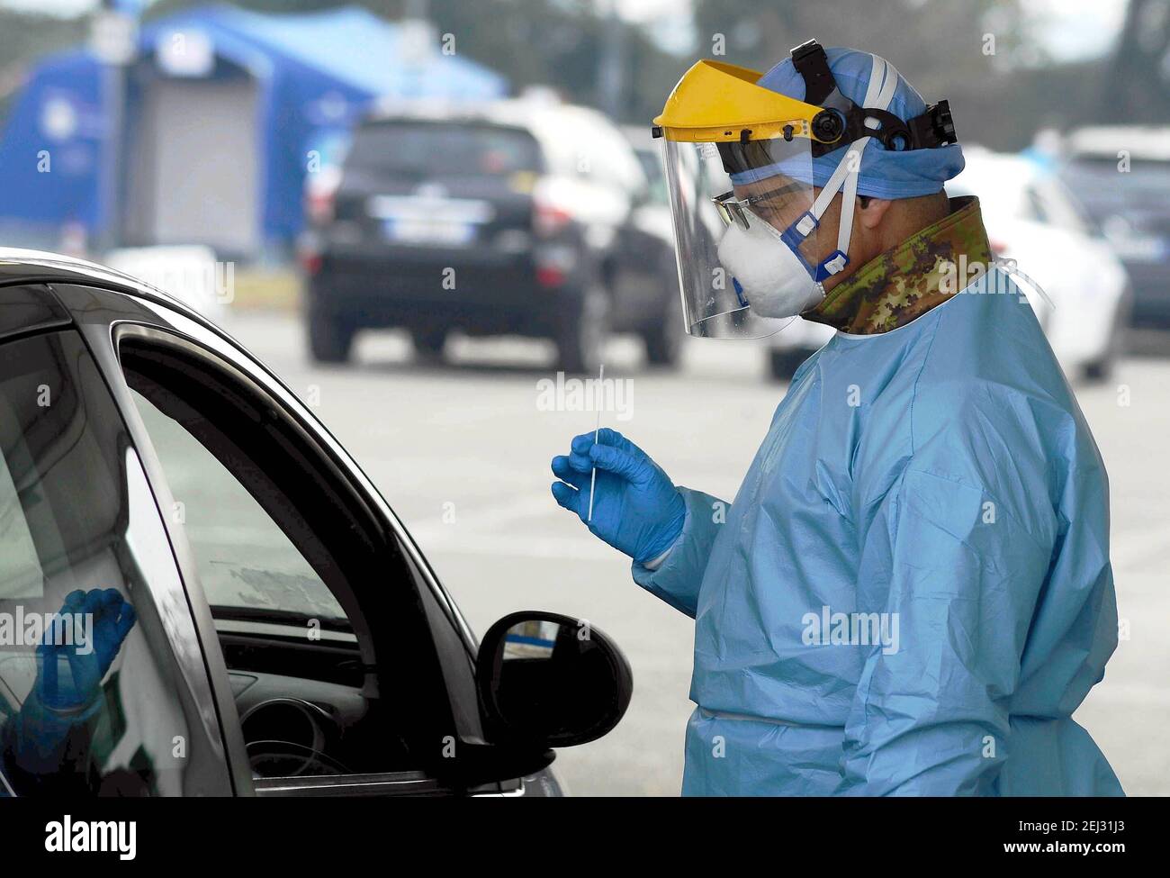 Reportage, Italy. 13th Mar, 2021. 3/13/2021 - Milan, Coronavirus emergency, Military field hospital in train for taking covid swabs with drive in system (Milan - 2020-11-28, Maurizio Maule) ps the photo can be used in respect of the context in which it was taken, and without defamatory intent of the decorum of the people represented Editorial Usage Only (Photo by IPA/Sipa USA) Credit: Sipa USA/Alamy Live News Stock Photo