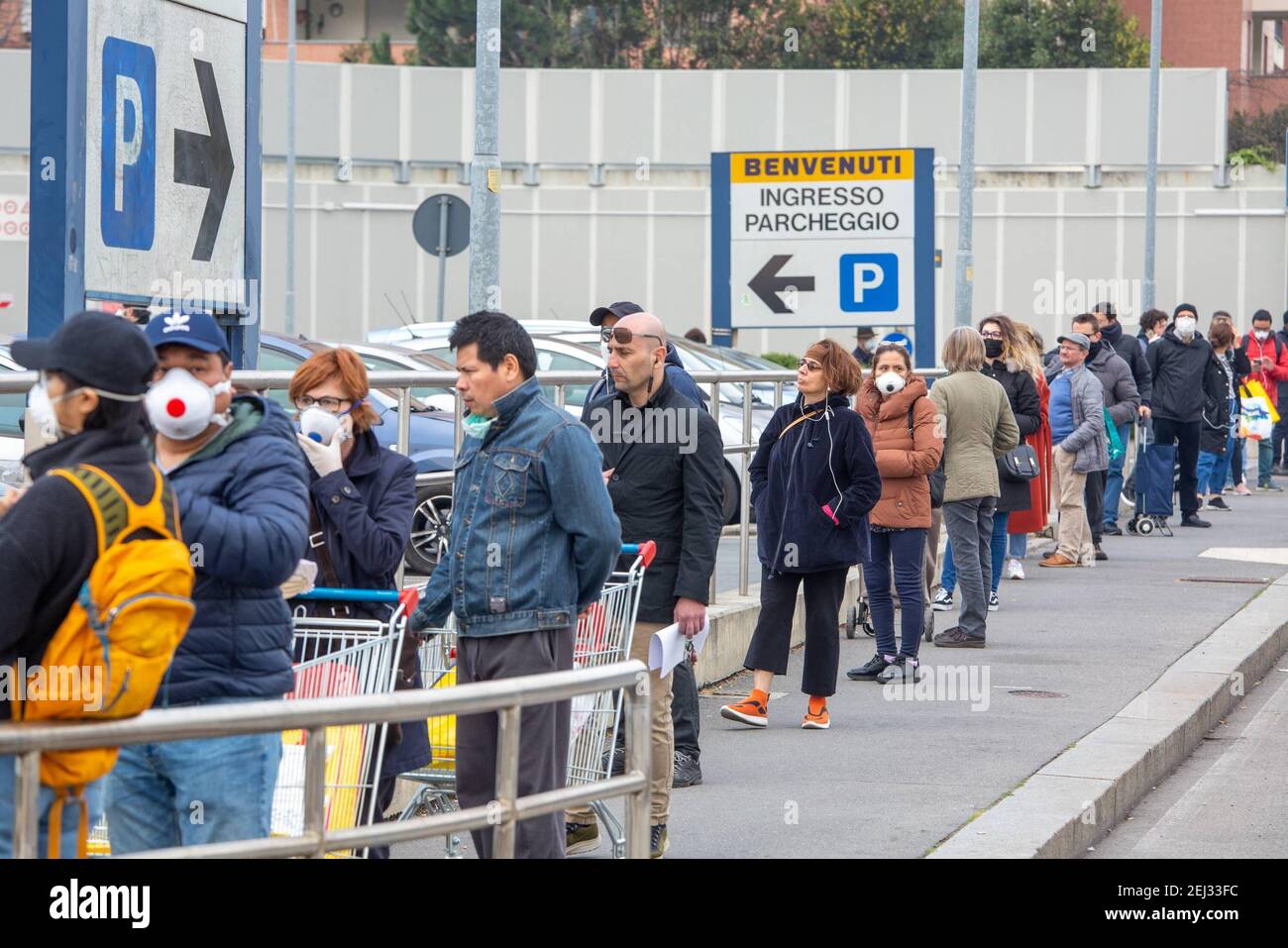 Reportage, Italy. 13th Mar, 2021. 3/13/2021 - Milan, Coronavirus emergency, long queues in front of all supermarkets. In the photo Esselunga via Rubattino (Milan - 2020-03-20, Massimo Alberico) ps the photo can be used in compliance with the context in which it was taken, and without the defamatory intent of the decorum of the people represented Editorial Usage Only (Photo by IPA/Sipa USA) Credit: Sipa USA/Alamy Live News Stock Photo