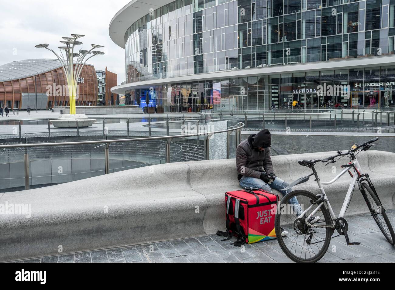 Reportage, Italy. 13th Mar, 2021. 3/13/2021 - Milan. Riders Deliver Food and Food no increase in requests due to COVID19 Coronavirus in piazza gae aulenti (Milan - 2020-03-12, Carlo Cozzoli) ps the photo can be used in respect of the context in which it was taken, and without the defamatory intent of the decorum of the people represented Editorial Usage Only (Photo by IPA/Sipa USA) Credit: Sipa USA/Alamy Live News Stock Photo