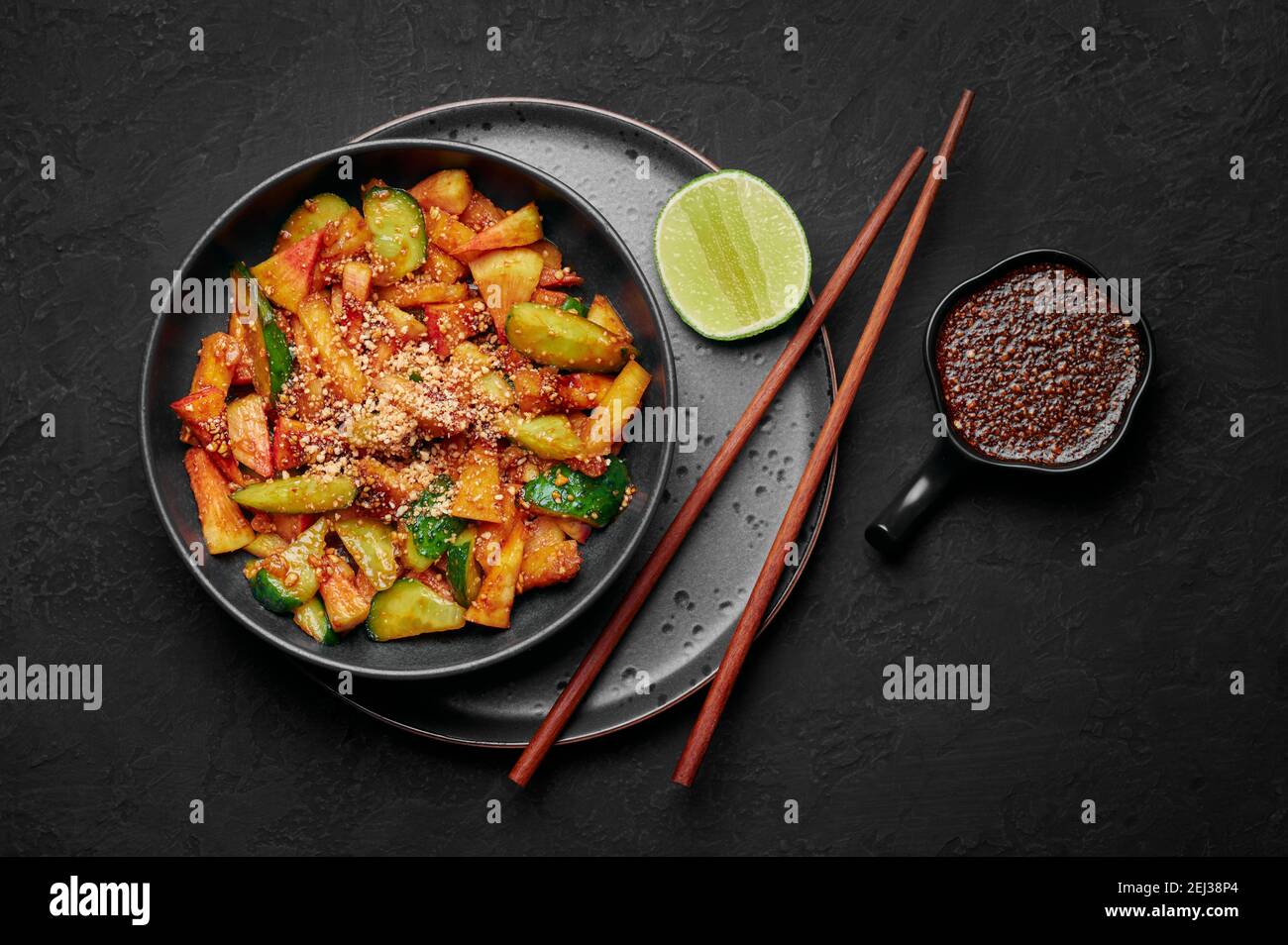 Penang Rojak in black bowl on dark slate table top. Malaysian or