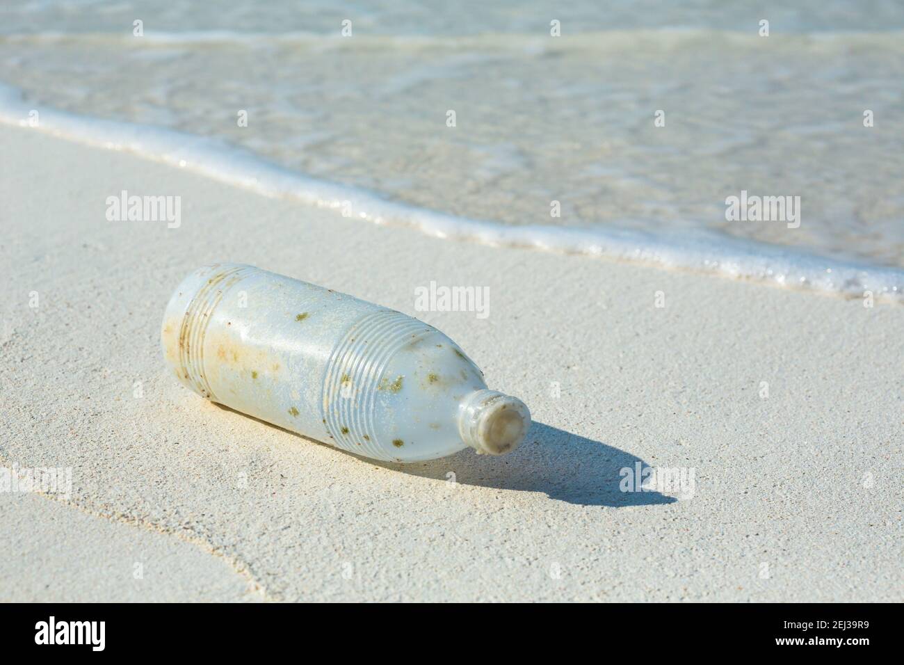 A Plastic Water Bottle Washed Ashore Stock Photo Alamy