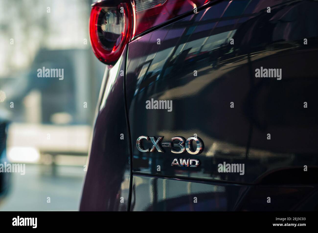 Mazda CX-30 AWD emblem on car back door closeup, Moscow, 18 Feb 2021 Stock Photo