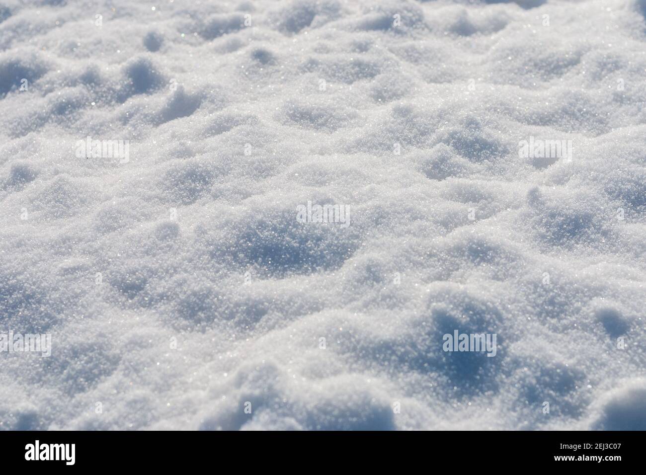 Fresh snow with lights and shadows, closeup Stock Photo