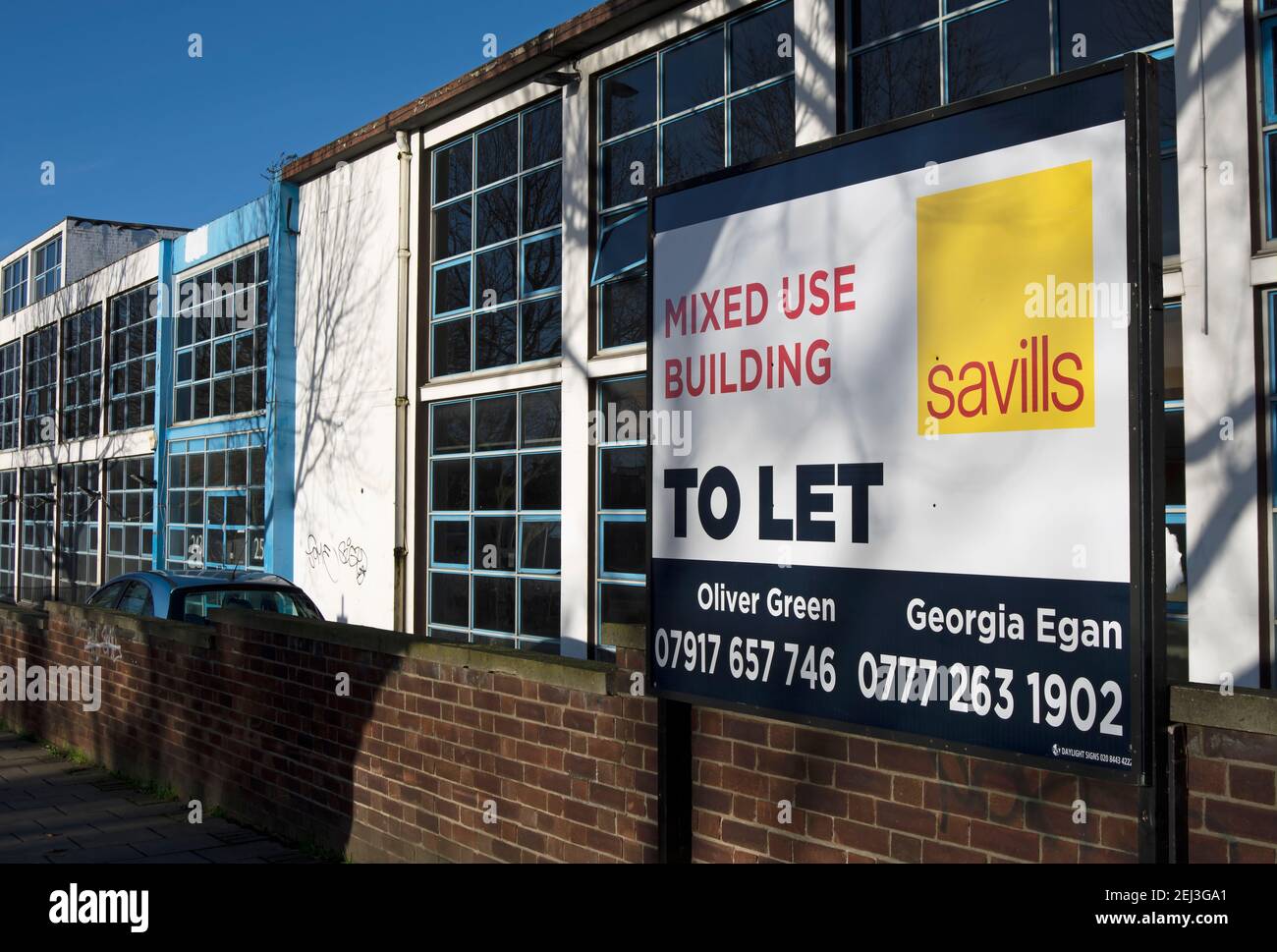 estate agent sign advertising a mixed use building to let, in richmond, london, england Stock Photo