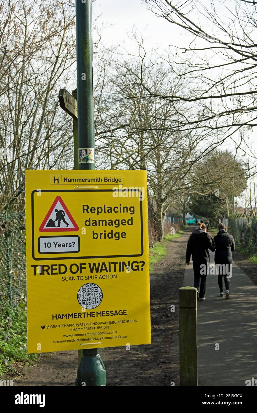 sign placed by hammersmith residents campaign group encouraging action to repair and re-open hammersmith bridge, in barnes, london, england Stock Photo
