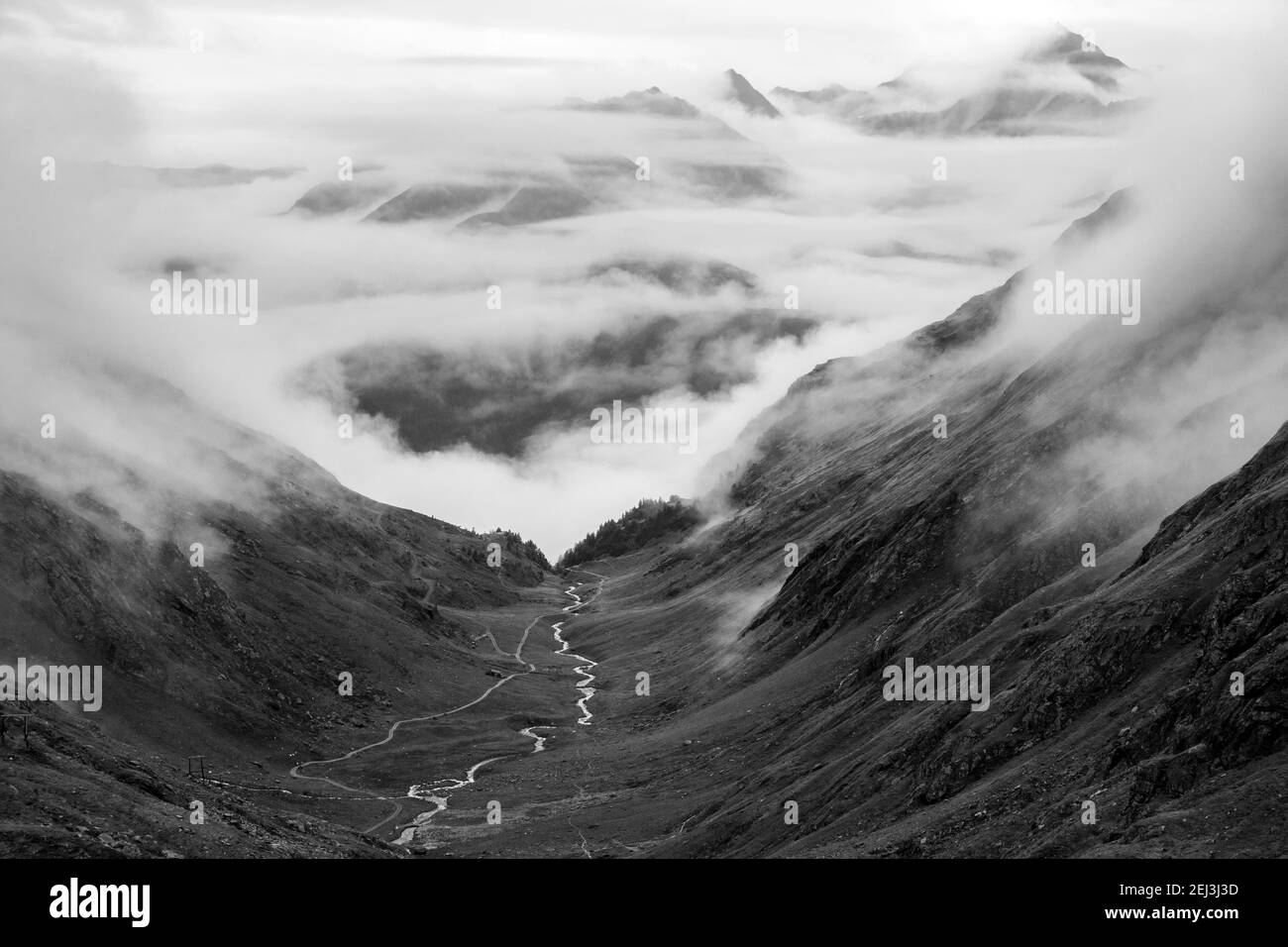 Timmel valley (Timmeltal). Alpine torrent. Evocative clouds. Venediger group. Virgental. Austrian Alps. Europe. Stock Photo