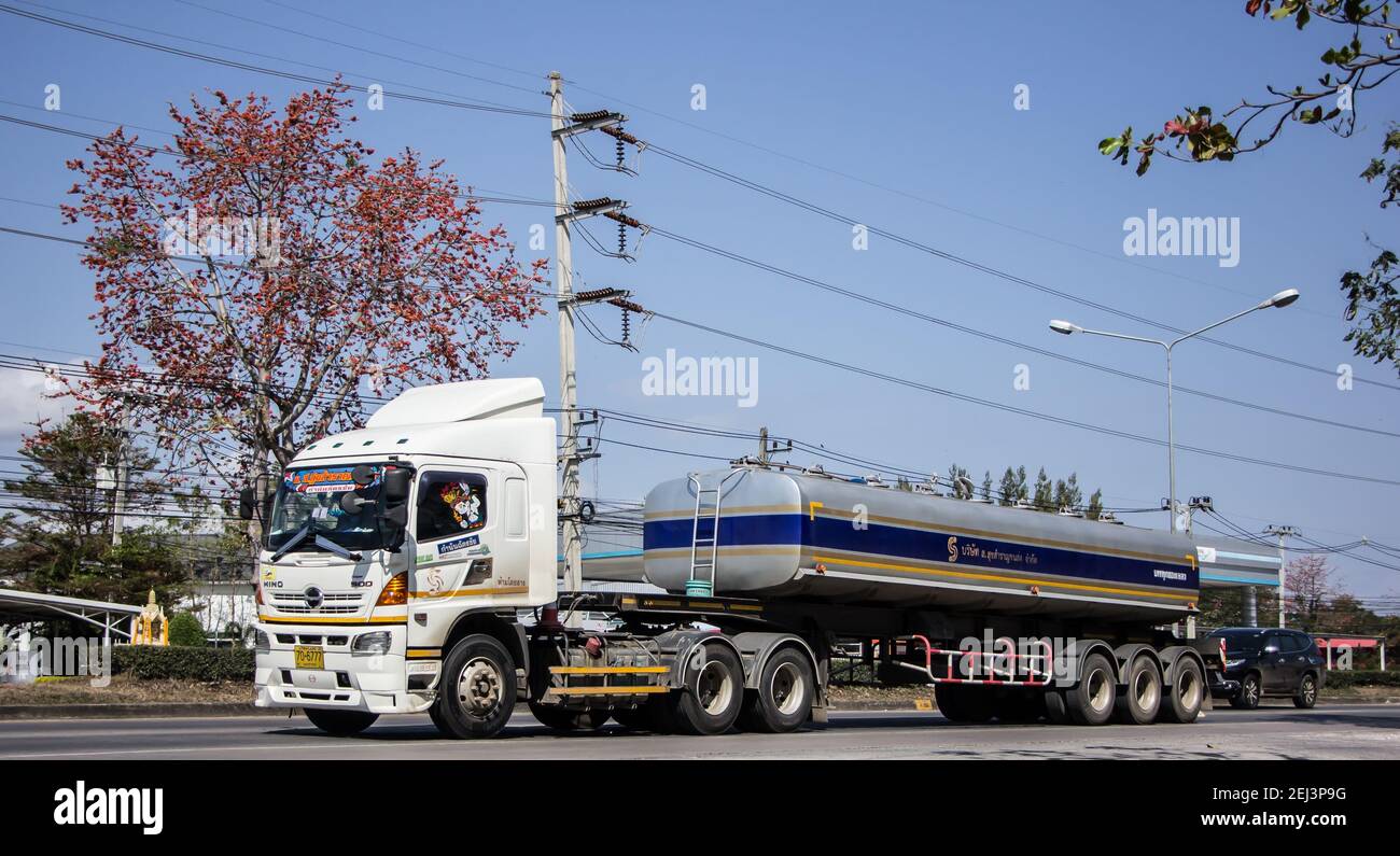 Chiangmai, Thailand - February  9 2021: Trailer Truck and Palm Oil Tank Truck of Suksamran Transport. Photo at road no 121 about 8 km from downtown Ch Stock Photo