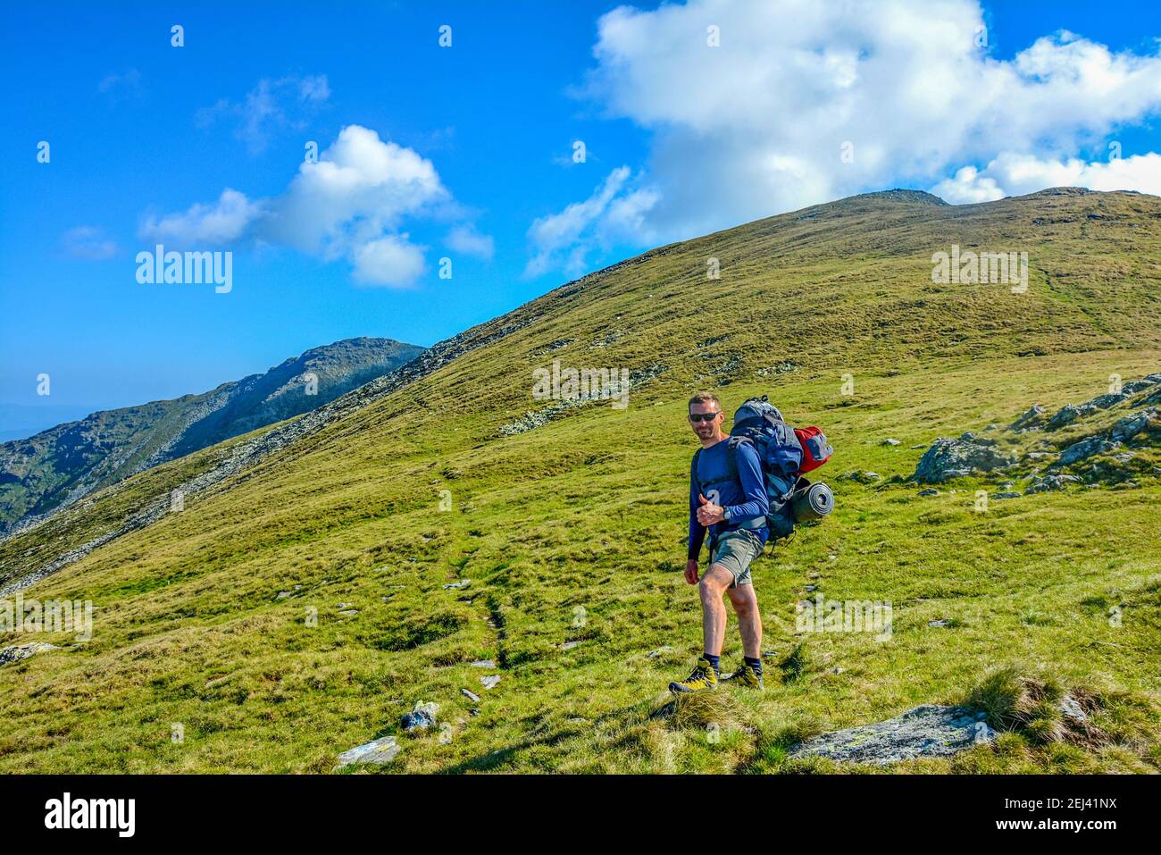 Young man trekking beautiful hi-res stock photography and images - Alamy