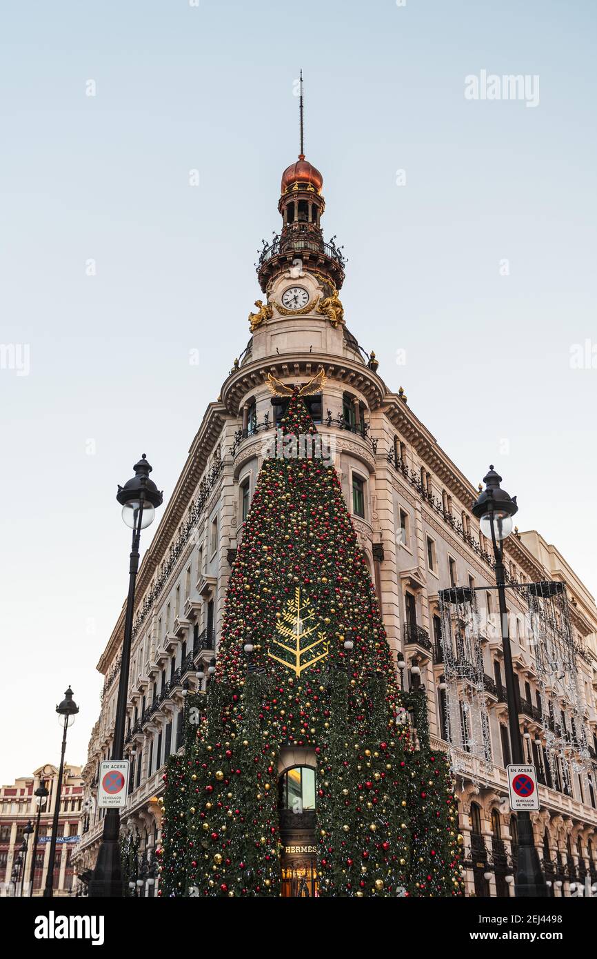 MADRID - DECEMBER 26, 2020: Wide-angle view of the recently renovated Centro Canalejas complex in Madrid, illuminated by the Christmas decorations at Stock Photo