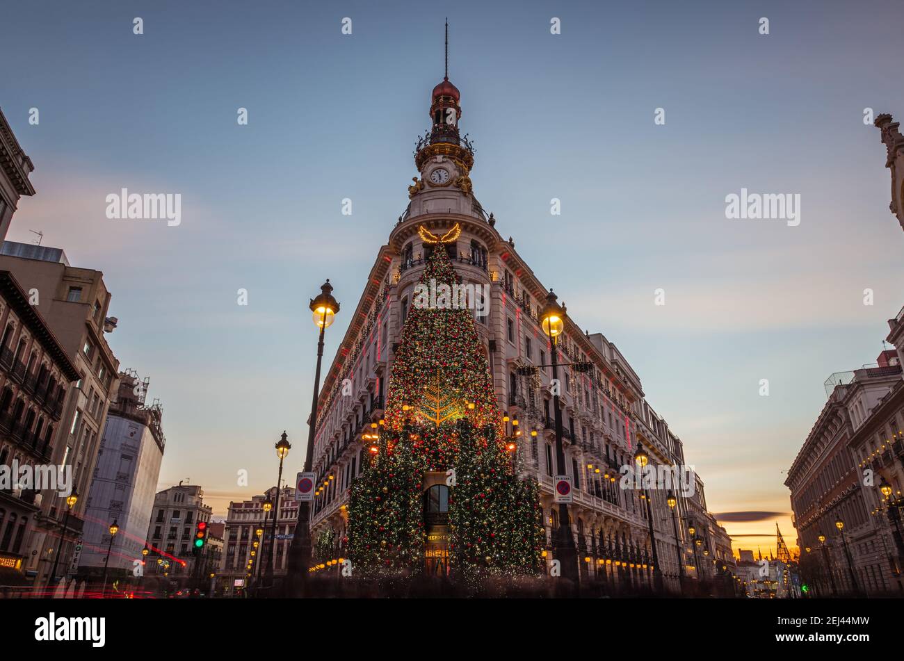 MADRID - DECEMBER 27, 2020: Wide-angle view of the recently renovated Centro Canalejas complex in Madrid, illuminated by the Christmas decorations at Stock Photo