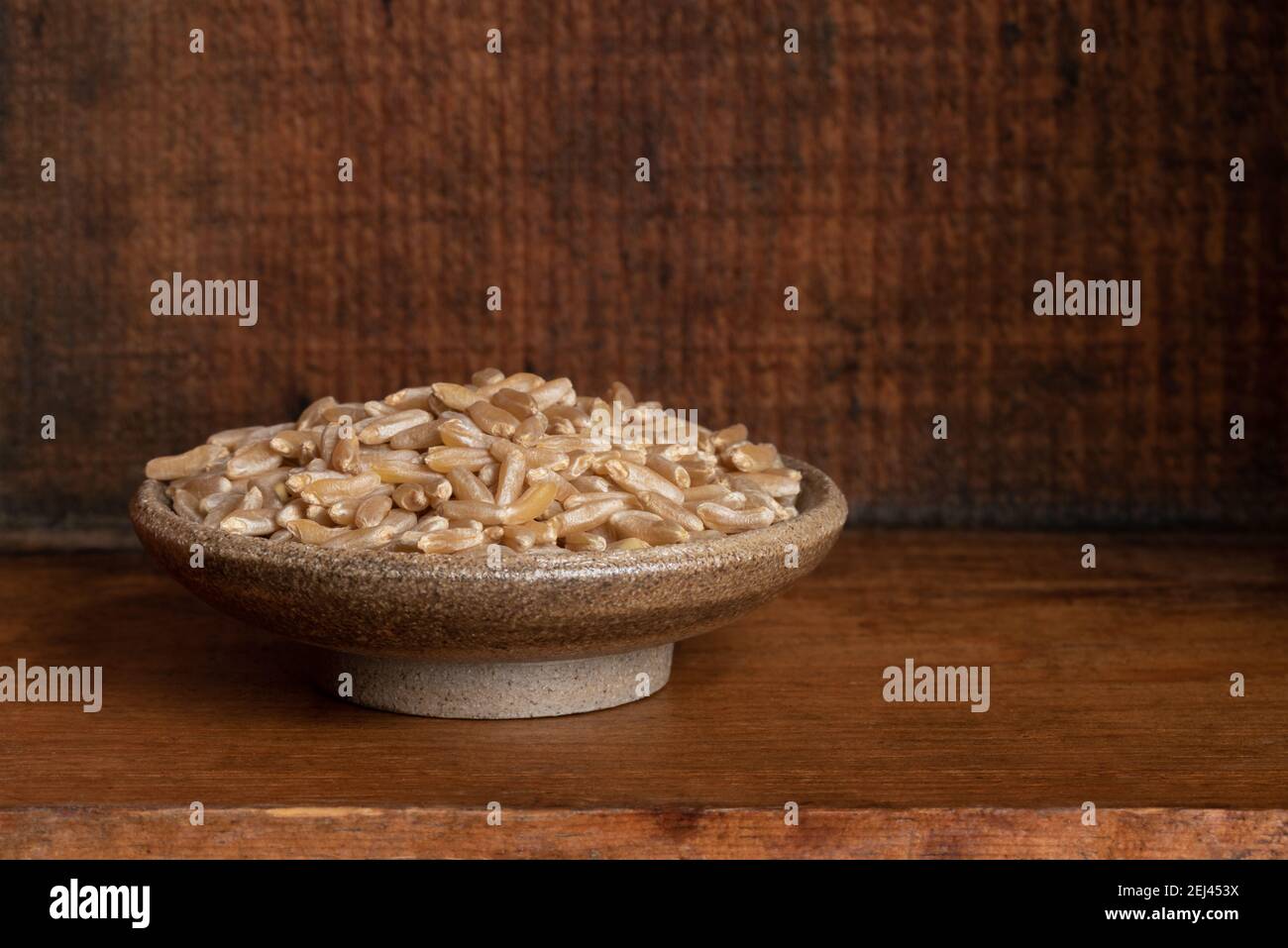 Uncooked Kamut Grain in a Bowl Stock Photo